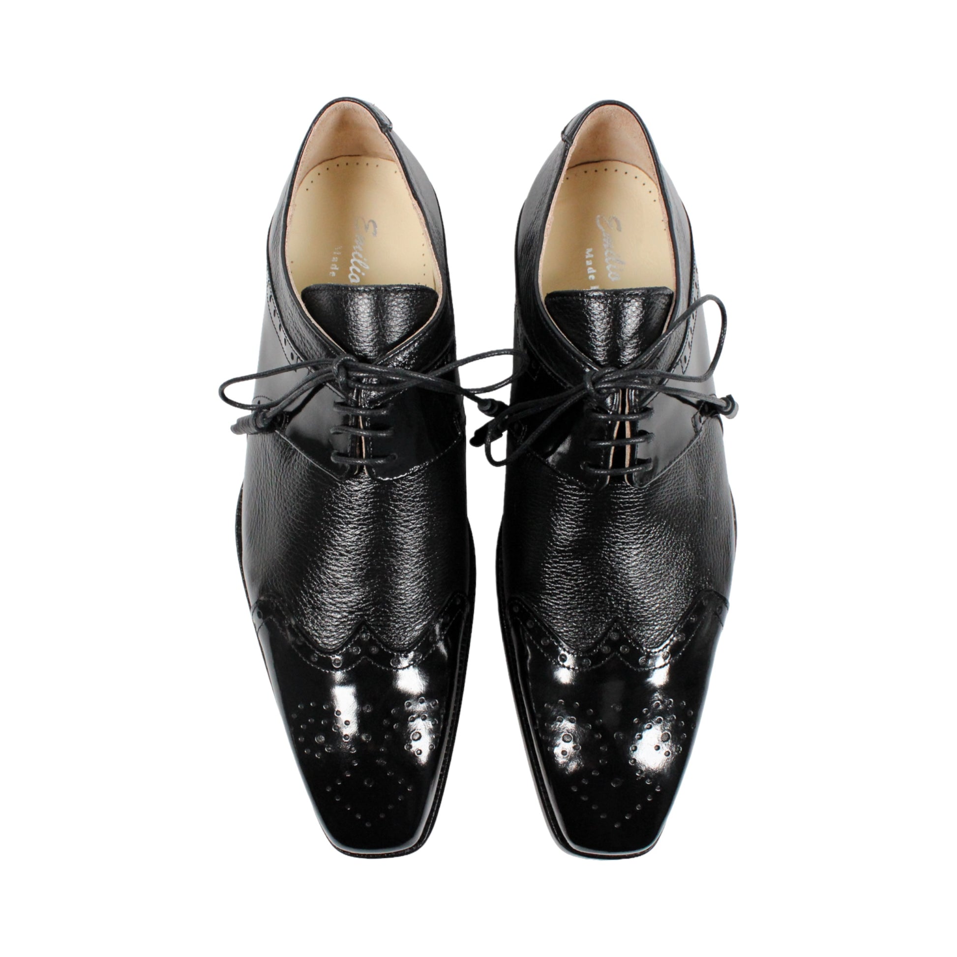 The Emilio Franco Luciano Black by Emilio Franco is an elegant men's dress shoe crafted from premium Italian leather, featuring a closed lacing system, low heel, and decorative perforations on the toe. Shown in profile against a plain white background, this luxury footwear exemplifies refined style.