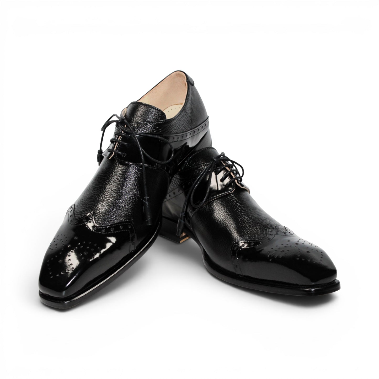 The Emilio Franco Luciano Black by Emilio Franco is an elegant men's dress shoe crafted from premium Italian leather, featuring a closed lacing system, low heel, and decorative perforations on the toe. Shown in profile against a plain white background, this luxury footwear exemplifies refined style.