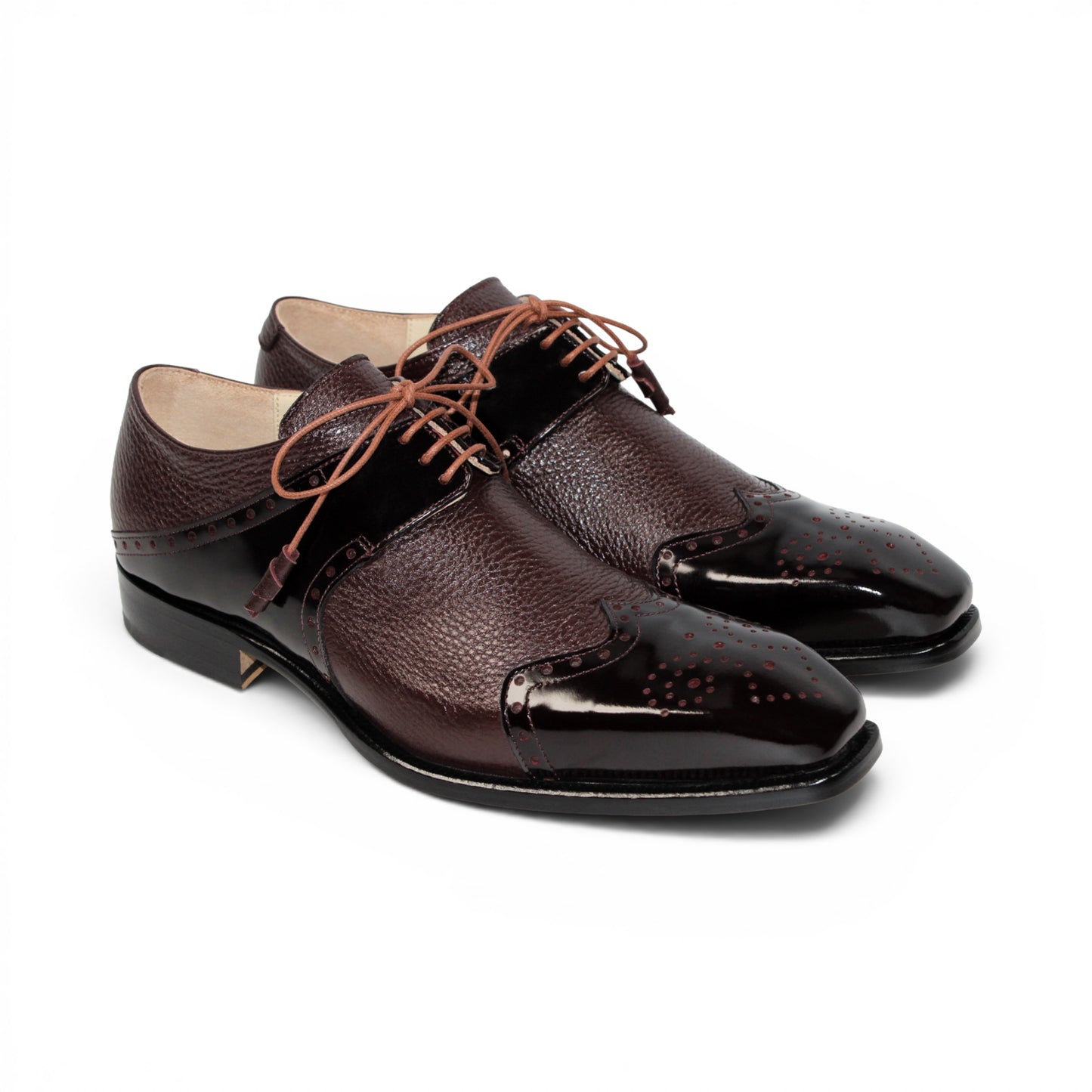An Emilio Franco Luciano Burgundy oxford shoe, crafted from premium leather in a rich burgundy shade, features laces, classic wingtip detailing, and a polished finish on the toe and side panels, displayed in profile against a white background.