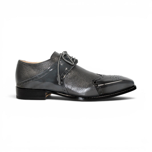 The Emilio Franco Luciano Grey dress shoe by Emilio Franco is shown in profile on a white background: this single gray leather shoe features laces, a glossy toe cap, and subtle decorative perforations—exemplifying the refinement of luxury men's footwear crafted from genuine deerskin.