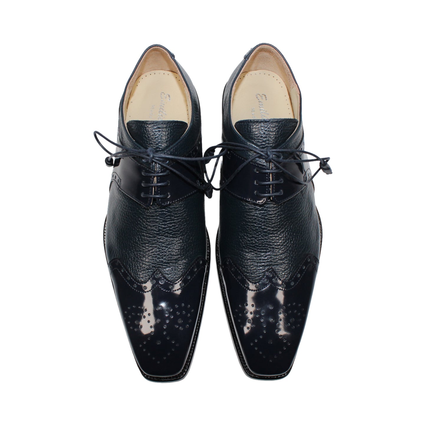 The Emilio Franco Luciano Navy by Emilio Franco is a luxury men's shoe in dark blue Italian leather, featuring brogue detailing, laces, and a low black heel, displayed on a white background.