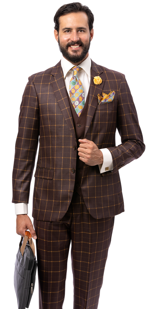A man wearing the EJ Samuel Brown Suit M2817 by EJ SAMUEL, paired with a vibrant tie and pocket square, holds a gray bag and smiles while standing against a plain white background.