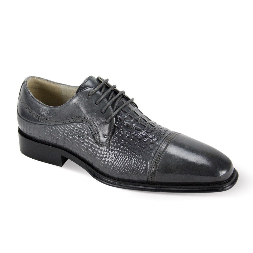 Giovanni Mattias shoes by GIOVANNI, crafted from grey leather, feature a textured pattern, sleek laces, and a refined cap toe.