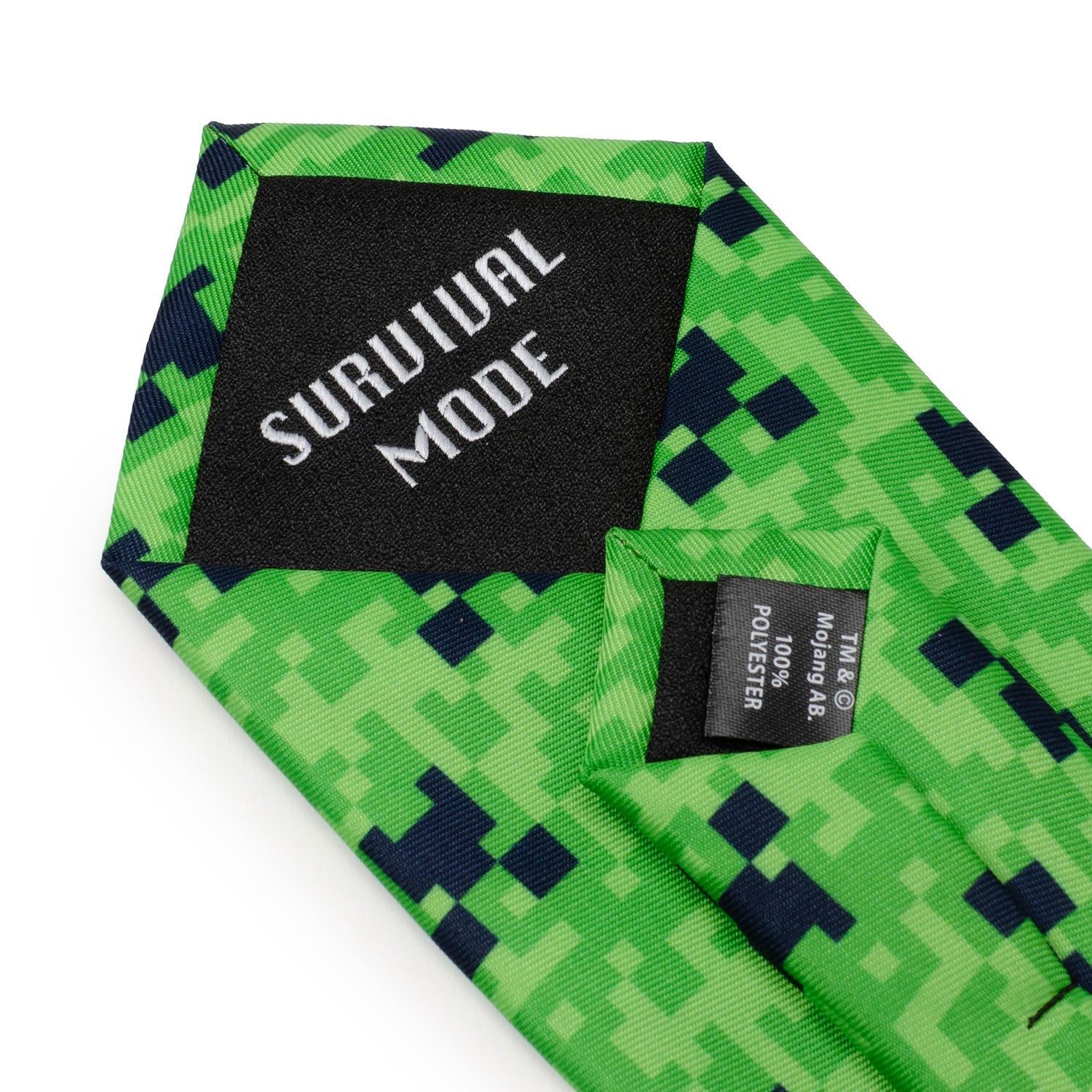 The Minecraft Creeper Green Boy's Tie by Cufflinks.com features a pixelated green design inspired by the iconic Creeper face from the video game Minecraft.