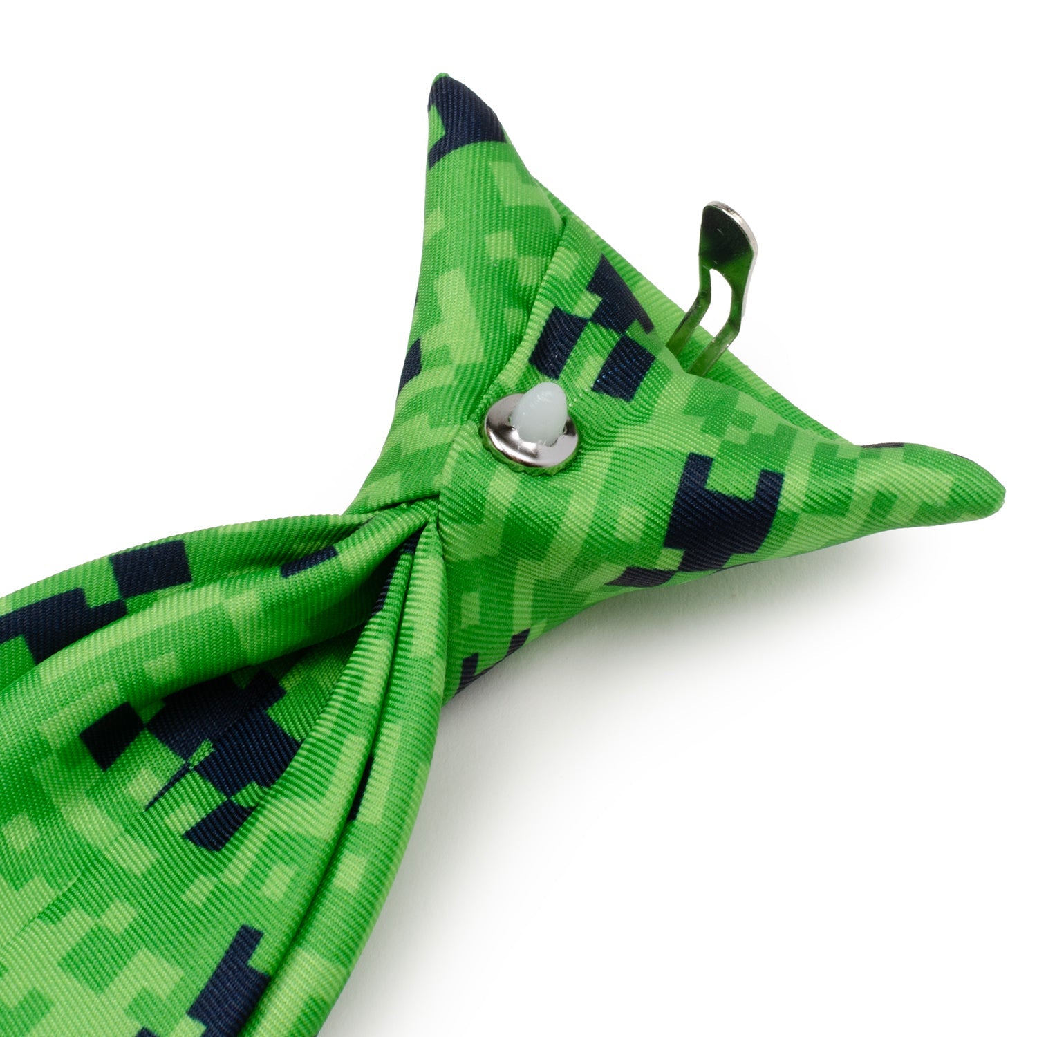 The Minecraft Creeper Green Boy's Tie by Cufflinks.com features a pixelated green design inspired by the iconic Creeper face from the video game Minecraft.
