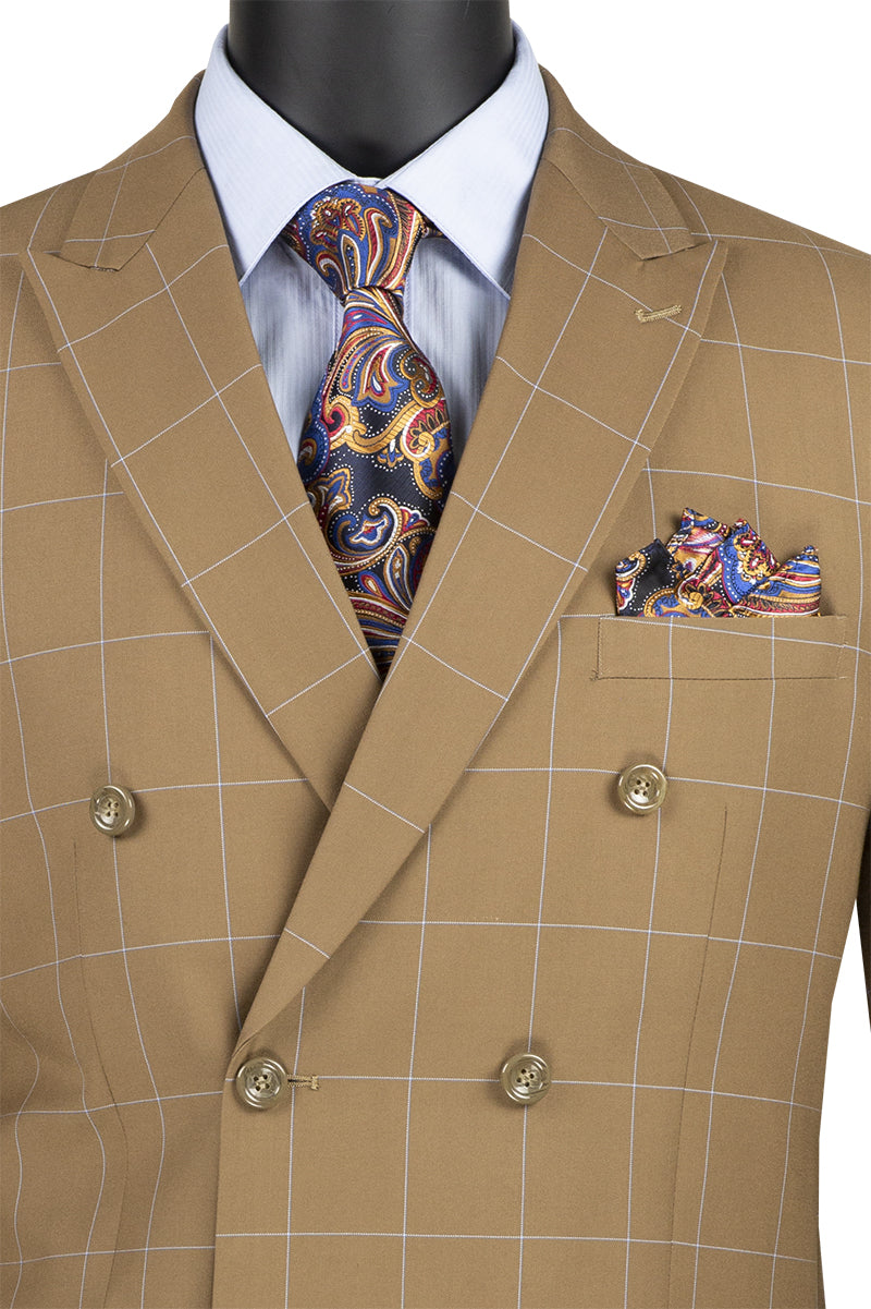 The Vinci Suits Modern Fit Double Breasted Windowpane Peak Lapel 2 Piece Suit in Camel (MDW-1) offers a sophisticated grid pattern and pairs elegantly with a blue shirt, paisley tie, and colorful pocket square for a contemporary look.