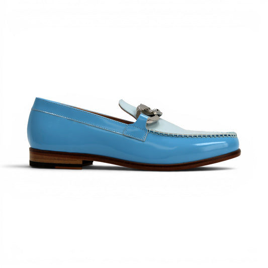 The Emilio Franco M2 Light Blue is a shiny light blue genuine leather loafer by Emilio Franco, featuring a silver decorative buckle on top and a classic leather sole, displayed on a flat white background.