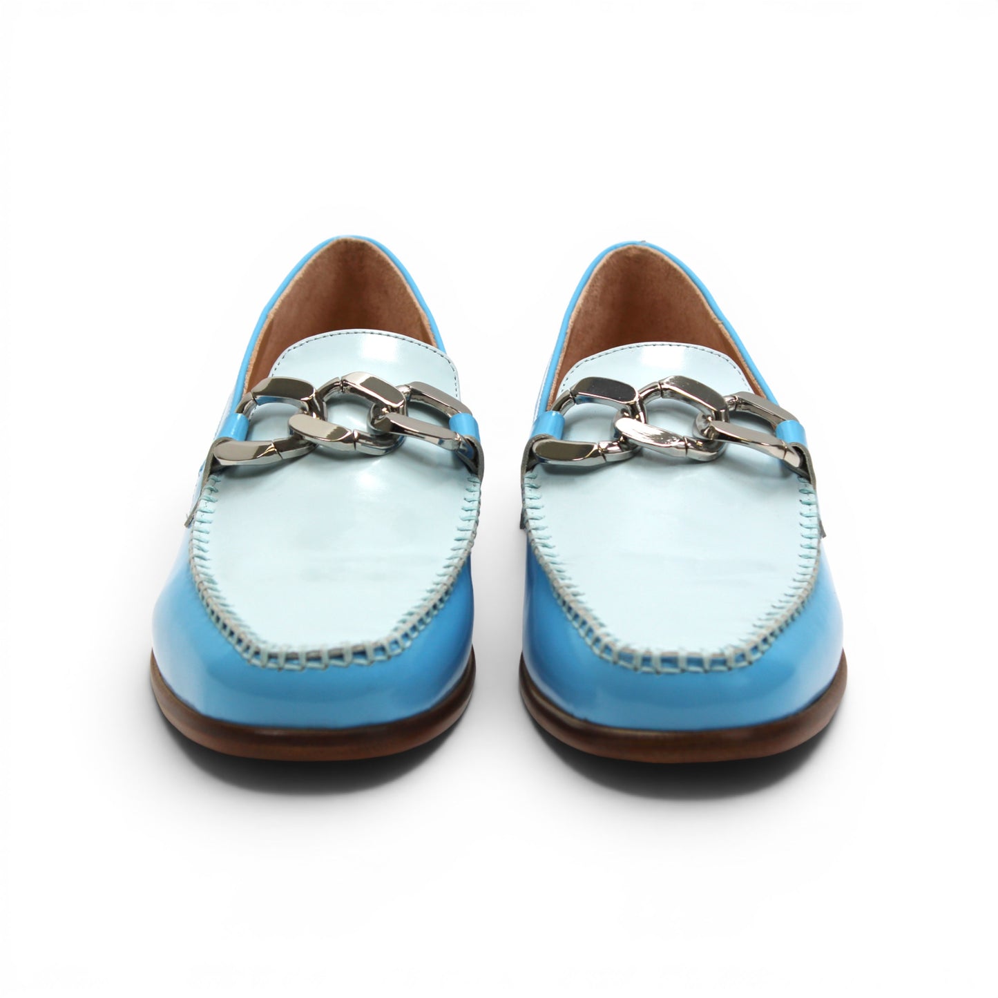 The Emilio Franco M2 Light Blue is a shiny light blue genuine leather loafer by Emilio Franco, featuring a silver decorative buckle on top and a classic leather sole, displayed on a flat white background.