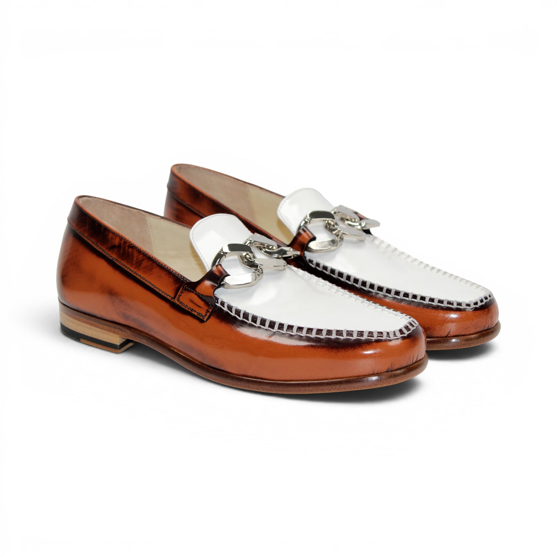 The Emilio Franco M2 Brandy/White is an Italian-crafted loafer by Emilio Franco, made from premium brown and white genuine leather. It features a classic leather sole, silver horsebit detail, low wooden heel, and stitched accents. Shown in side profile against a white background.