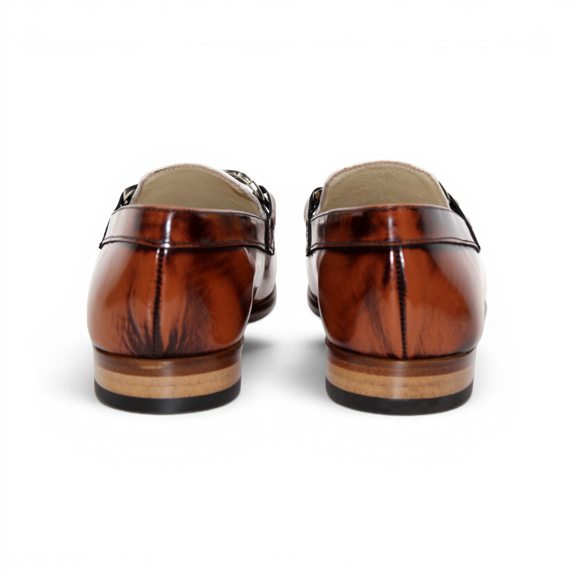 The Emilio Franco M2 Brandy/White is an Italian-crafted loafer by Emilio Franco, made from premium brown and white genuine leather. It features a classic leather sole, silver horsebit detail, low wooden heel, and stitched accents. Shown in side profile against a white background.