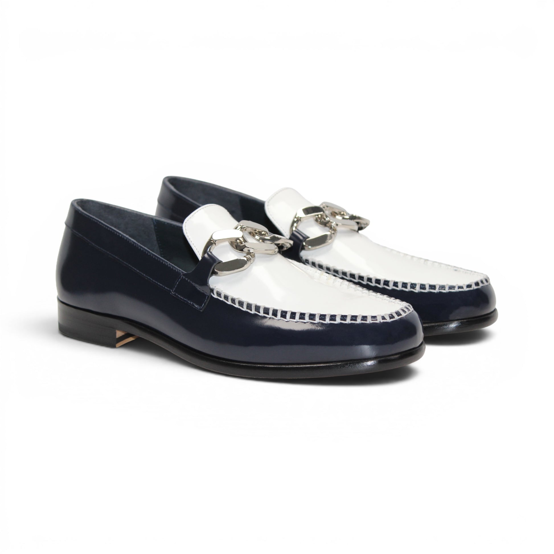 The Emilio Franco M2 Navy/White loafer by Emilio Franco is an Italian-crafted leather shoe in navy blue and white, featuring a metal buckle accent and shown in profile view on a white background.