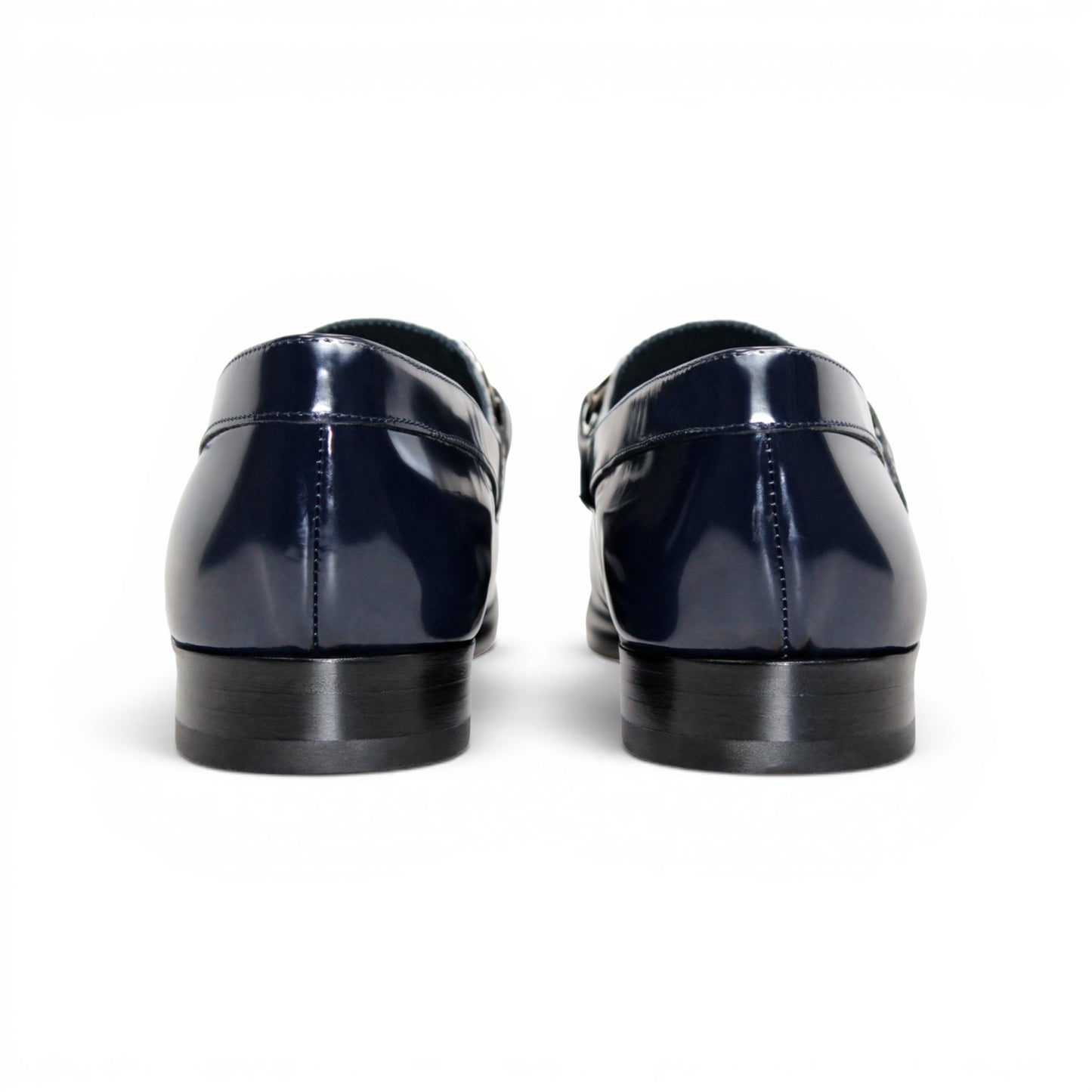 The Emilio Franco M2 Navy/White loafer by Emilio Franco is an Italian-crafted leather shoe in navy blue and white, featuring a metal buckle accent and shown in profile view on a white background.