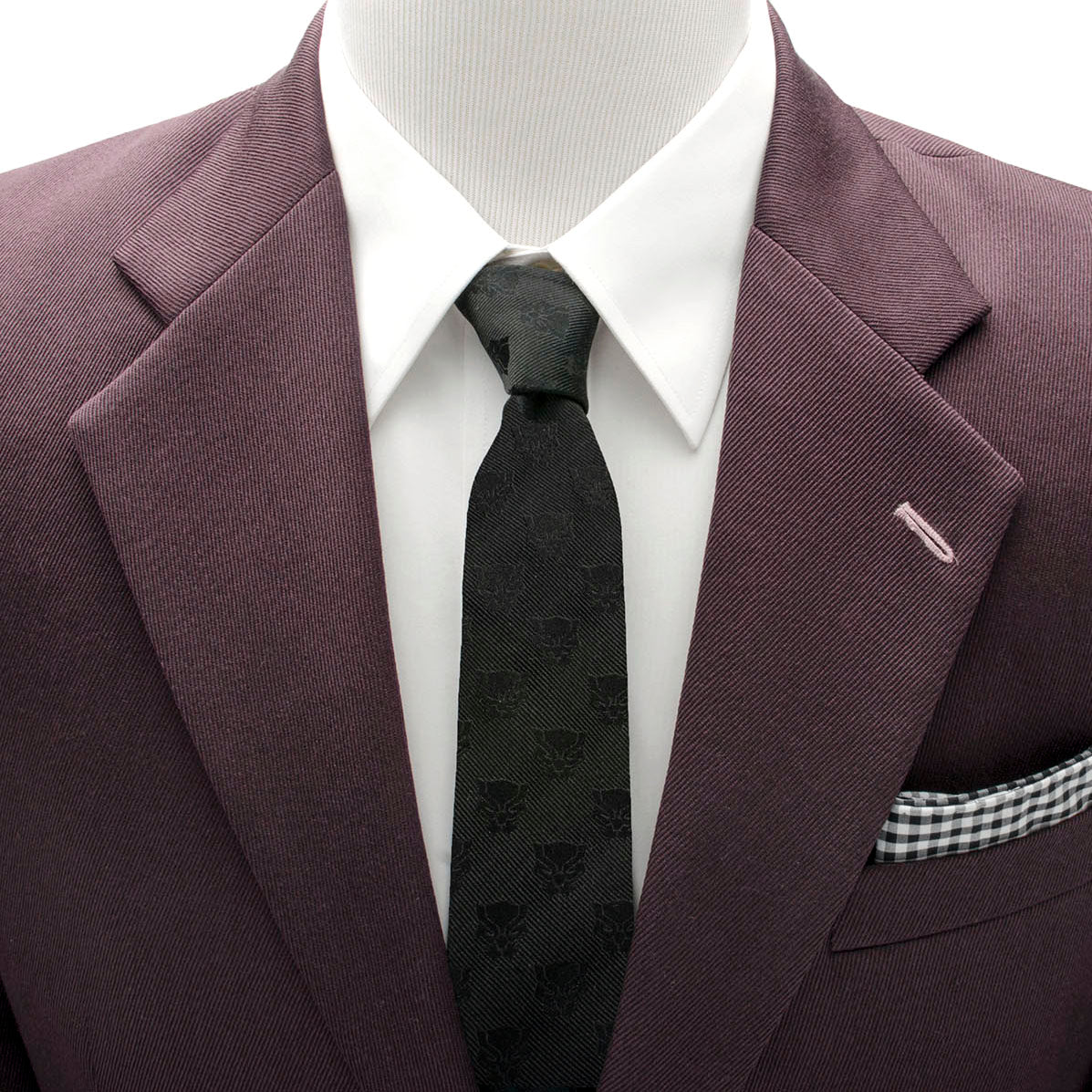 The Marvel Black Panther Men's Tie by Cufflinks.com is a rolled-up woven silk tie featuring a subtle, repeating pattern of the iconic mask emblem.