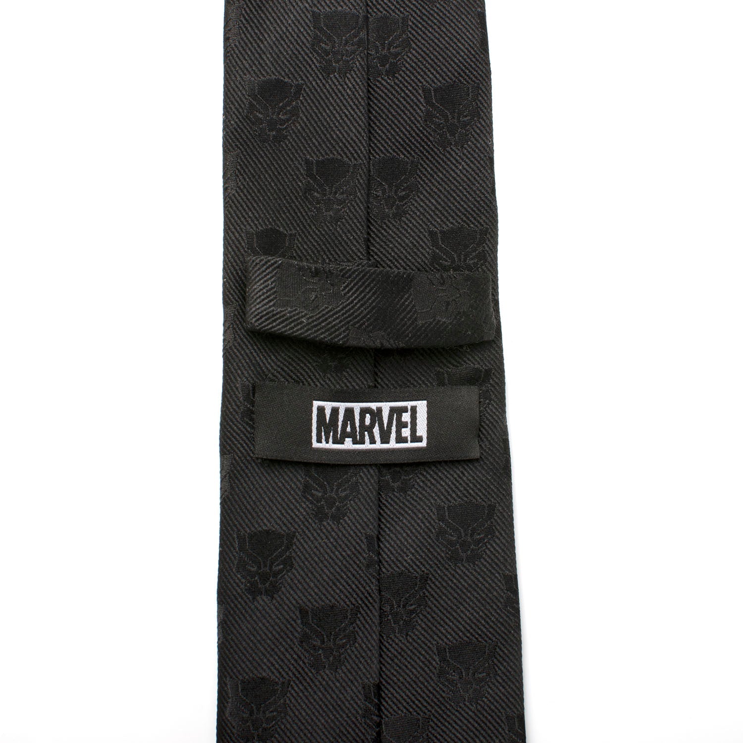 The Marvel Black Panther Men's Tie by Cufflinks.com is a rolled-up woven silk tie featuring a subtle, repeating pattern of the iconic mask emblem.