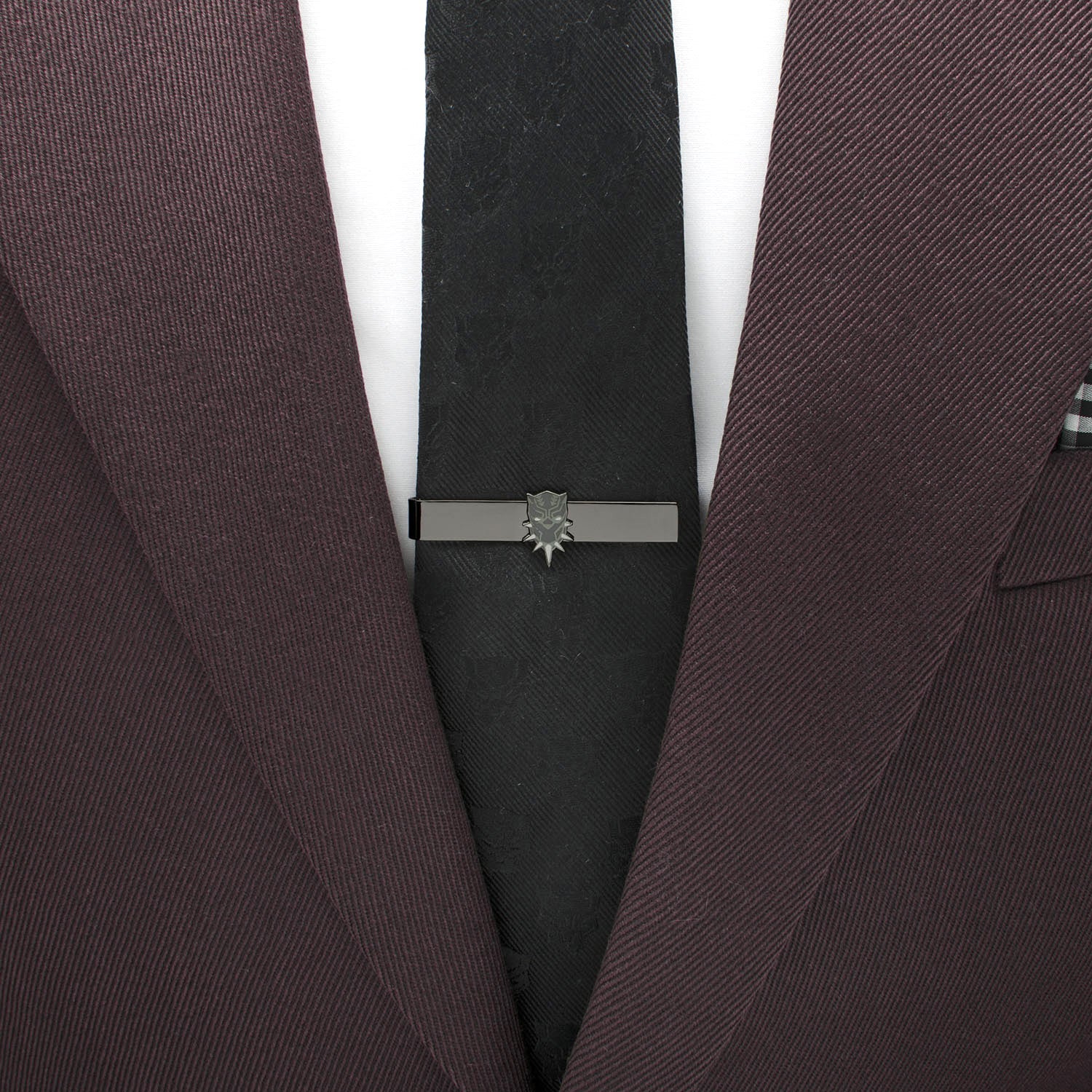 The Marvel Black Panther 3 Piece Necktie Gift Set by Cufflinks.com includes a black silk tie, matching cufflinks, and a tie clip—all featuring a panther mask design—making it the perfect accessory set for Black Panther fans.