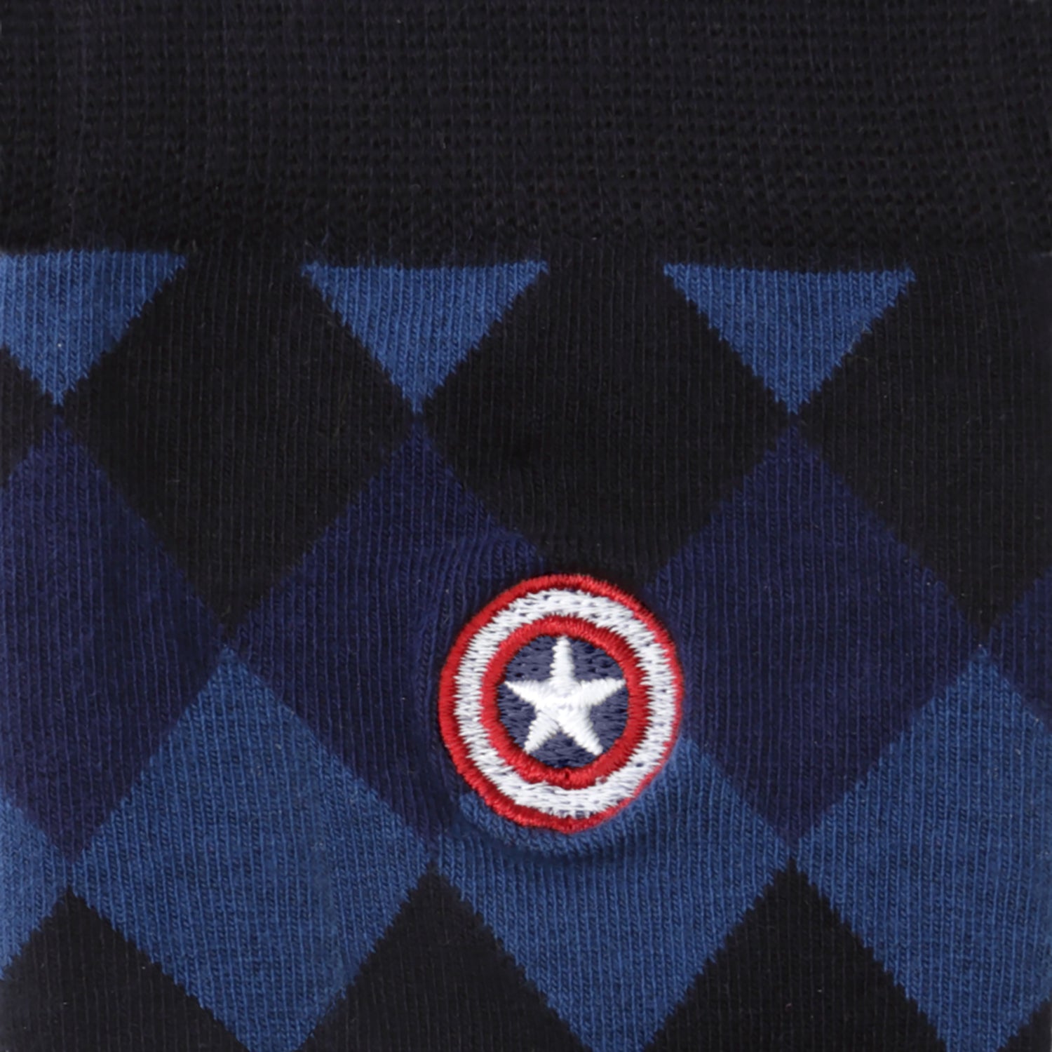 The Marvel Captain America Argyle Blue Gift Set by Cufflinks.com includes blue and black argyle socks with a small shield logo, plus a Captain America shield lapel pin—a perfect gift for any fan.