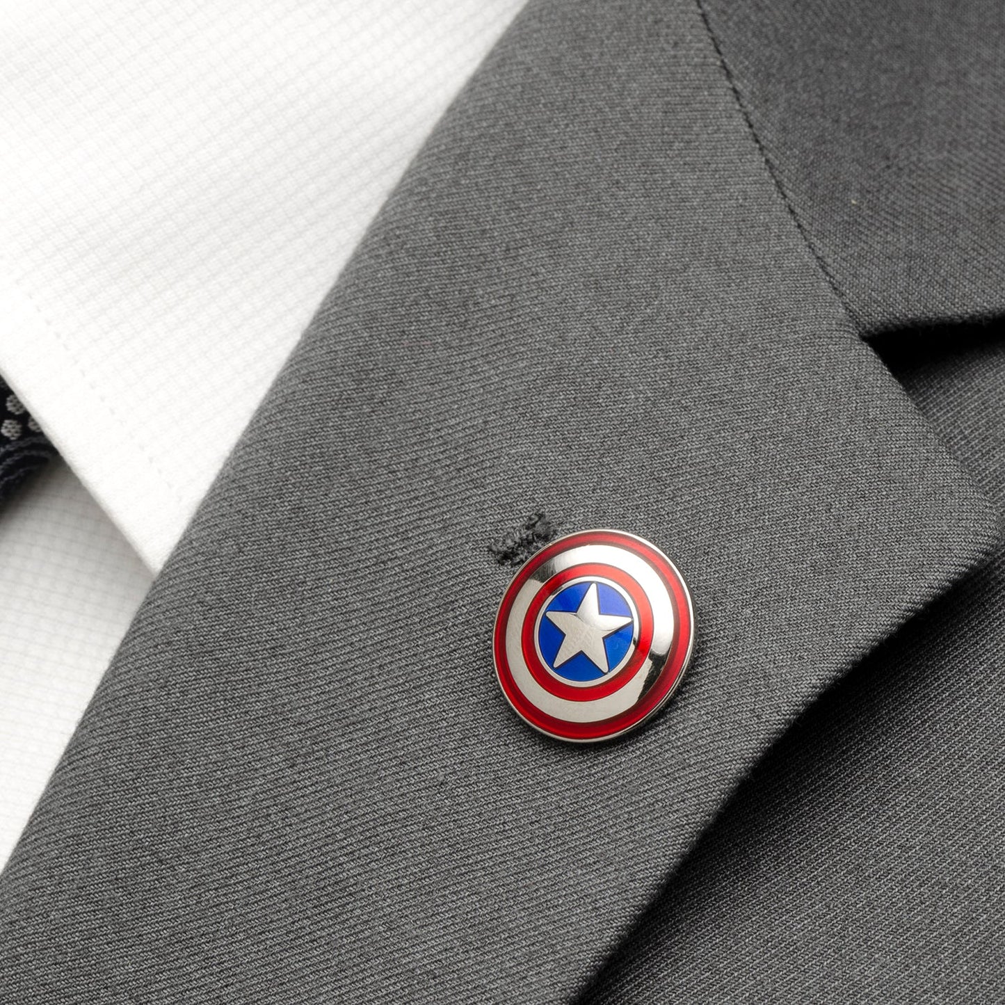 The Marvel Captain America Argyle Blue Gift Set by Cufflinks.com includes blue and black argyle socks with a small shield logo, plus a Captain America shield lapel pin—a perfect gift for any fan.