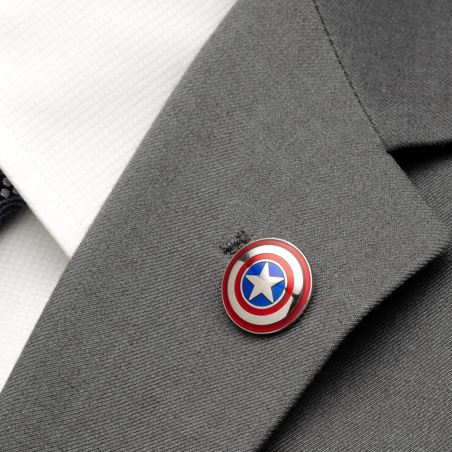 The Marvel Captain America Chevron Stripe Gift Set from Cufflinks.com features bold red, white, blue, and black striped socks paired with a Captain America pin—an ideal gift for Marvel fans.