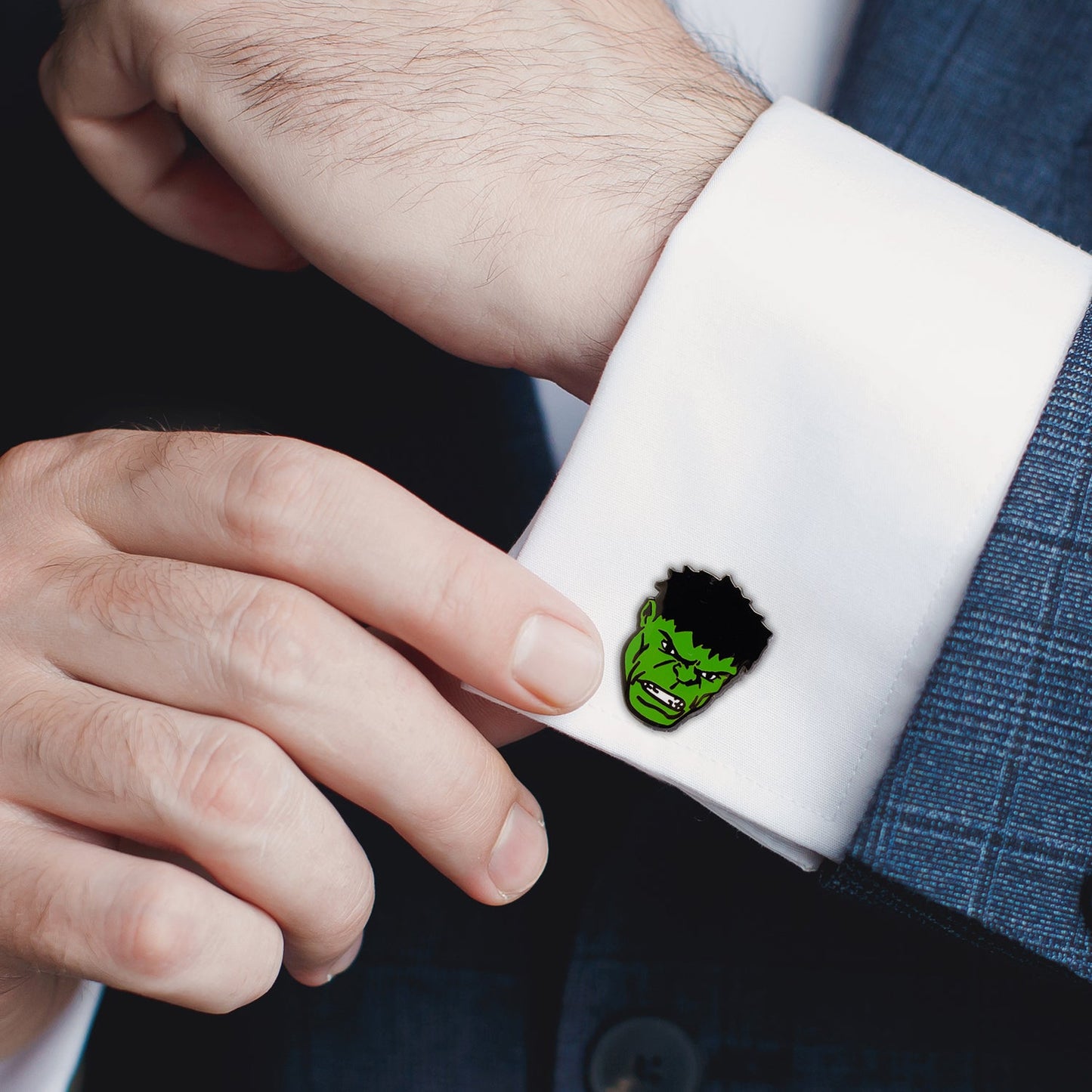 Add a bold touch to your style with Marvel Hulk Comics Pair Cufflinks from Cufflinks.com—superhero accessories featuring a green face and clenched fist, outlined in black, inspired by the Avengers.