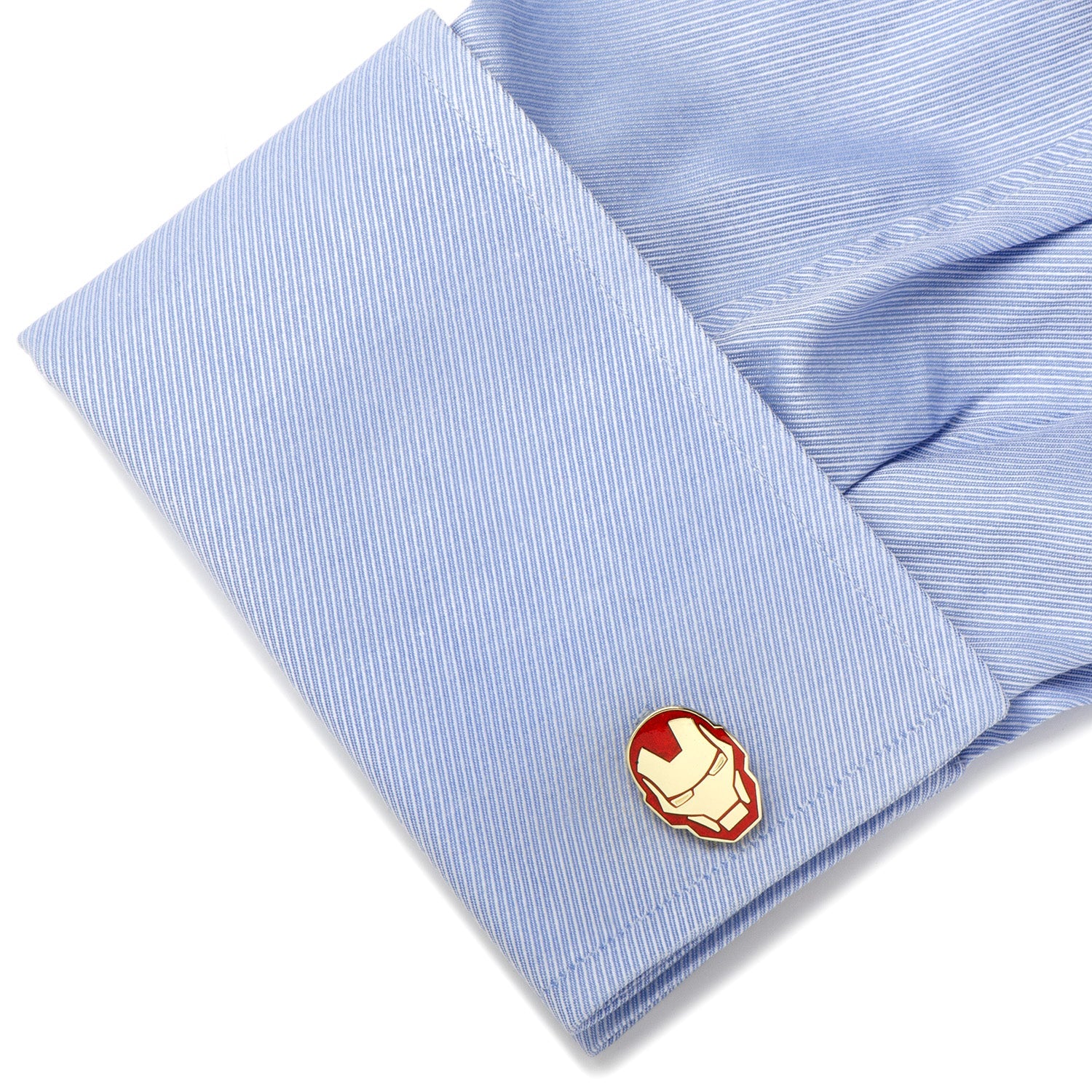 The Marvel Iron Man Cufflinks by Cufflinks.com feature one cufflink shaped like Iron Man’s mask with red detailing and the other as a round disc displaying the Marvel logo in black letters.