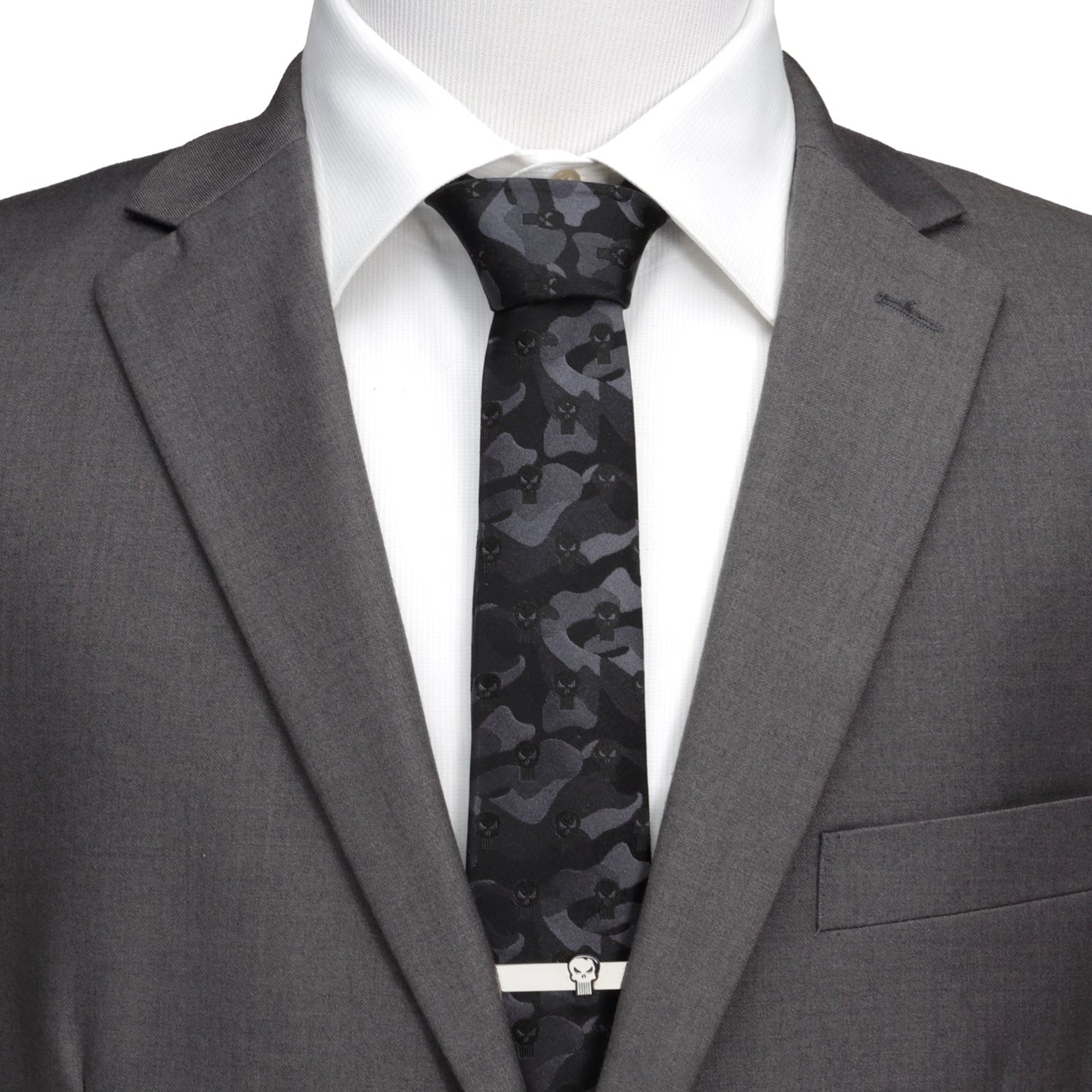 The Marvel The Punisher Camo Black Silk Men's Tie by Cufflinks.com features a subtle dark gray camouflage pattern with skull symbols, bringing superhero style to your suit.