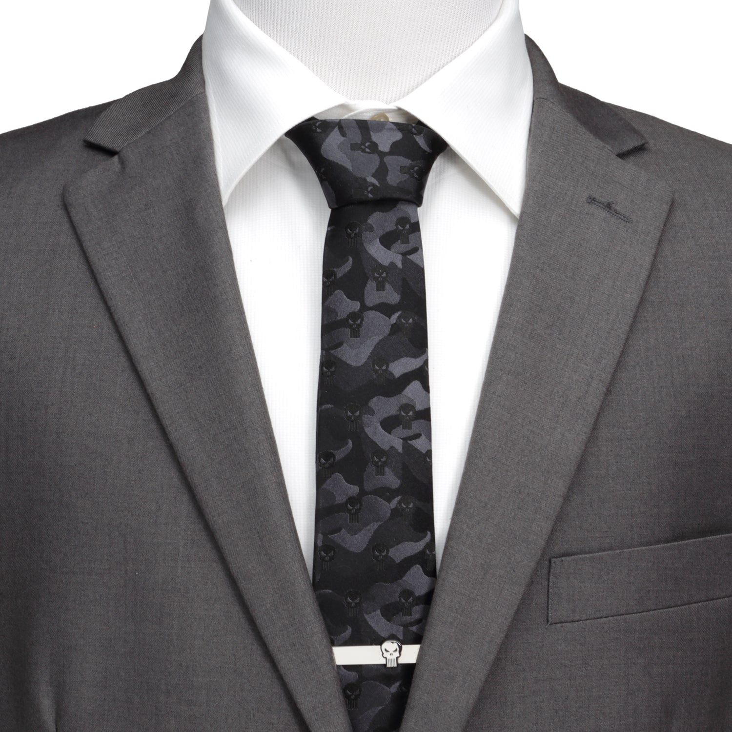 The Marvel The Punisher Camo Black Silk Men's Tie by Cufflinks.com features a subtle dark gray camouflage pattern with skull symbols, bringing superhero style to your suit.