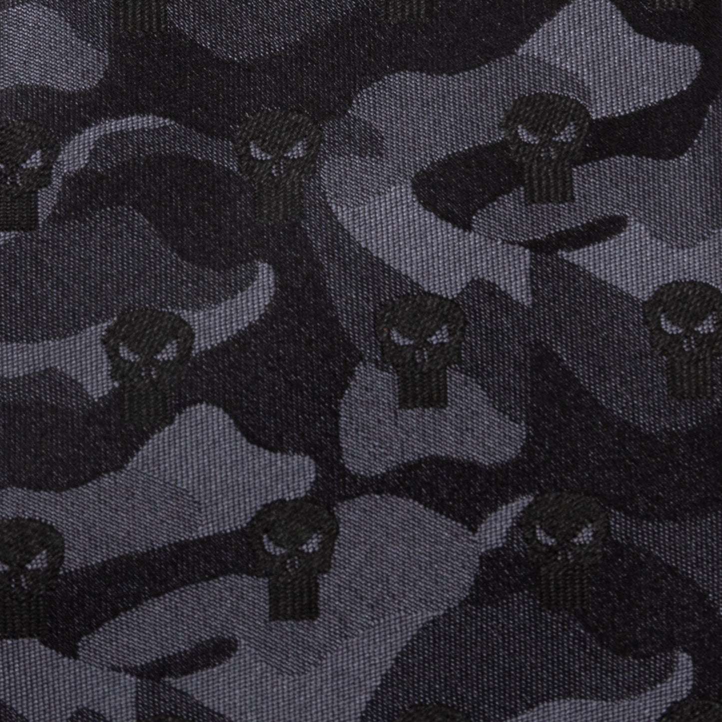 The Marvel The Punisher Camo Black Silk Men's Tie by Cufflinks.com features a subtle dark gray camouflage pattern with skull symbols, bringing superhero style to your suit.