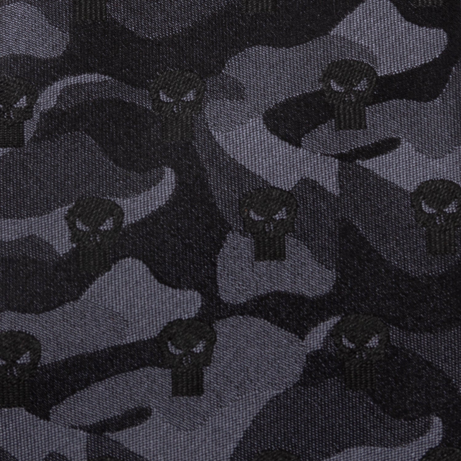 The Marvel The Punisher Camo Black Silk Men's Tie by Cufflinks.com features a subtle dark gray camouflage pattern with skull symbols, bringing superhero style to your suit.