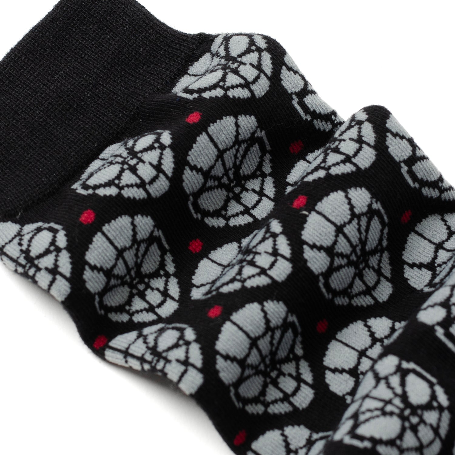 The Marvel Spider-Man Dot Gray and Black Gift Set by Cufflinks.com includes black socks with a gray mask pattern and a Spider-Man lapel pin—ideal for any Spider-Man fan.