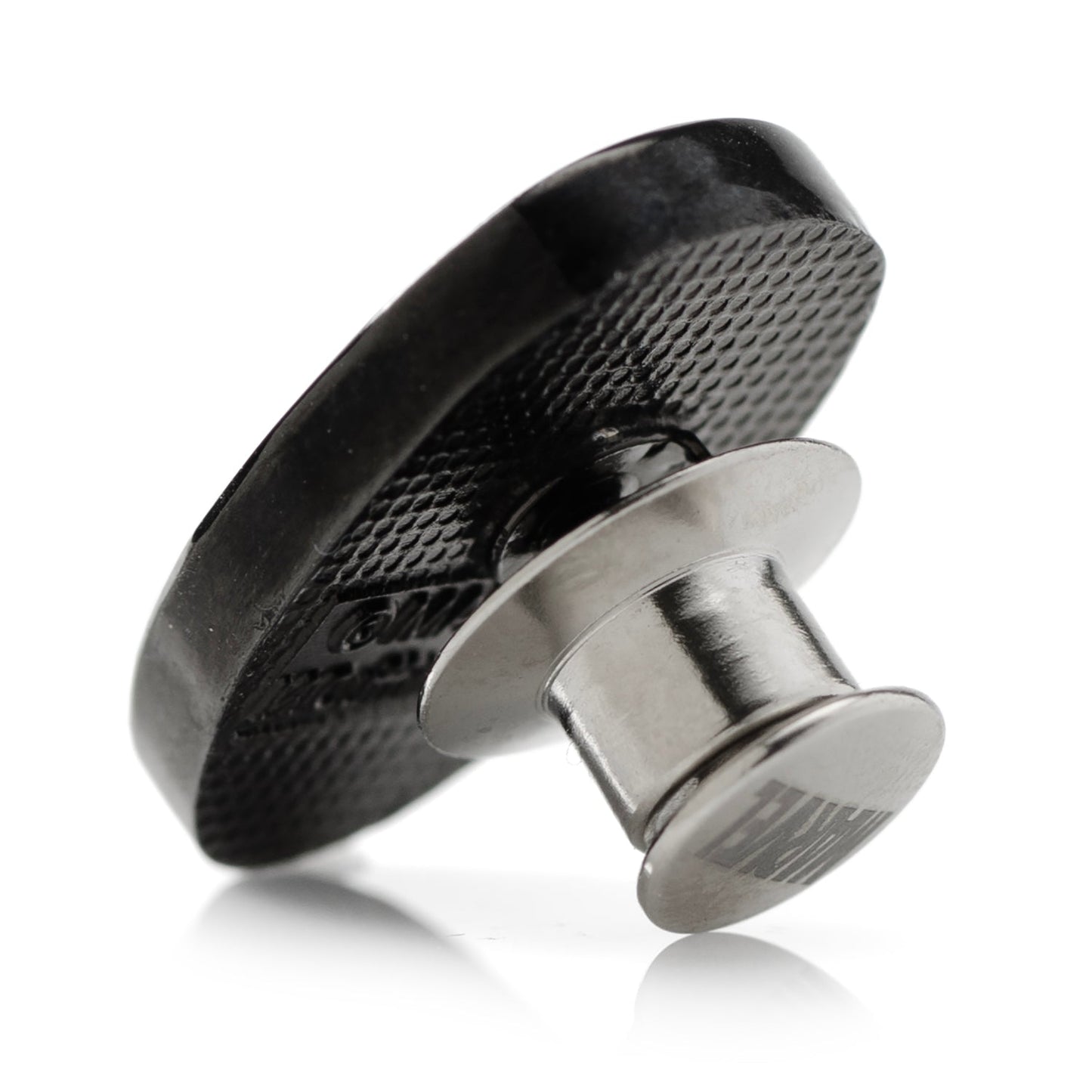 The Marvel Spider-Man Dot Gray and Black Gift Set by Cufflinks.com includes black socks with a gray mask pattern and a Spider-Man lapel pin—ideal for any Spider-Man fan.