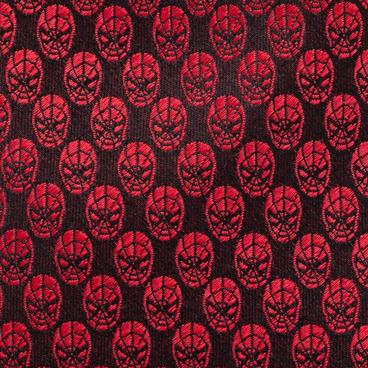 The Marvel Spider-Man Mask Red Men's Tie from Cufflinks.com features a crimson color with a black repeating design, crafted in silk and officially licensed, shown rolled up against a white background.