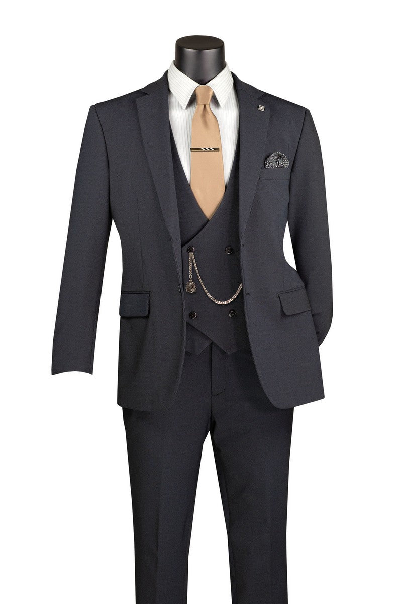 The Vinci Suits Modern Fit Charcoal Black 3 Piece Suit with Vest and Adjustable Waistband Pants MV2K-3 is shown styled with a white shirt, tan tie, pocket square, and vest chain on a mannequin.