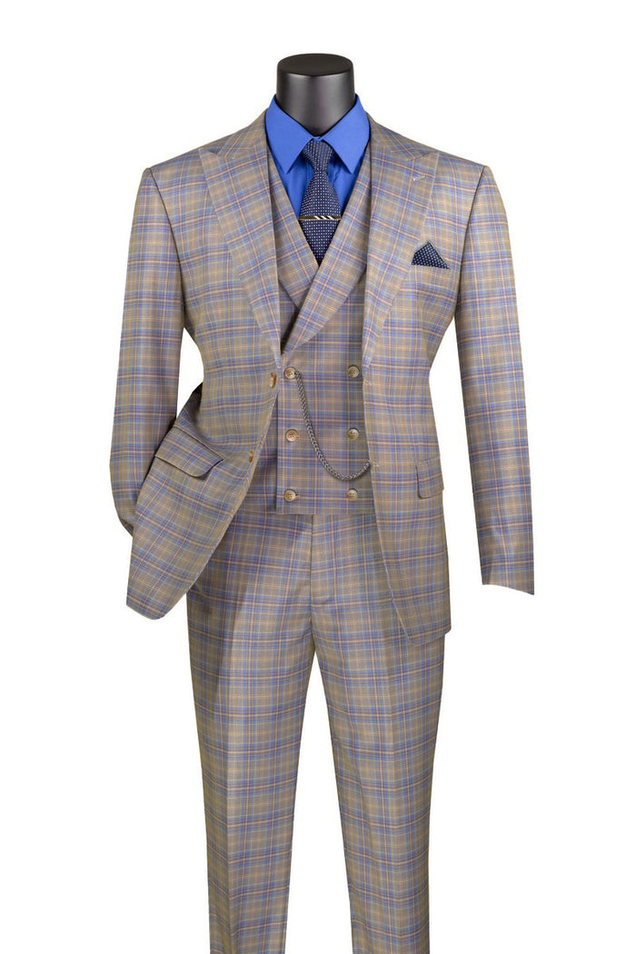 Vinci Suits' Modern Fit Windowpane Peak Lapel 3 Piece Suit (Blue MV2W-3) features a brown patterned suit with a double-breasted vest. It’s elegantly paired with a blue shirt, navy tie, and dotted pocket square on a mannequin.