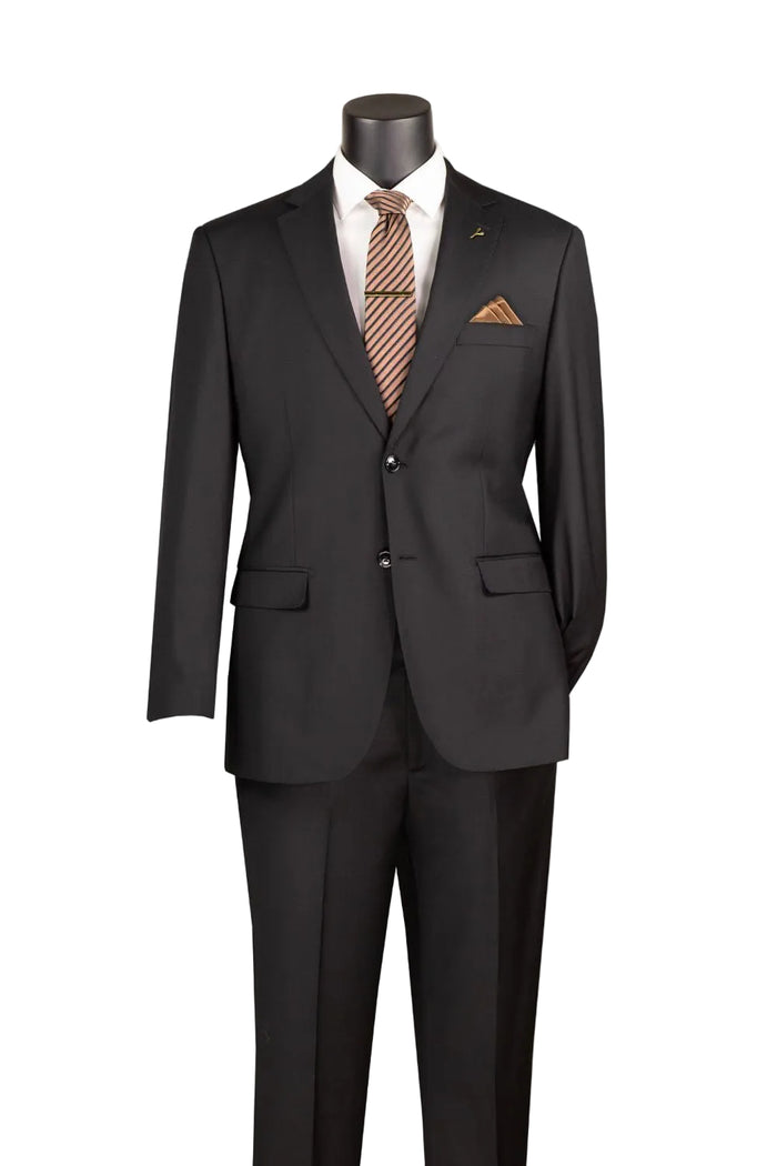 The Vinci Suits Modern Fit Black 100% Wool Single Breasted 2-Button Suit MW100 is styled with a white shirt, brown striped tie, and pocket square on a mannequin.