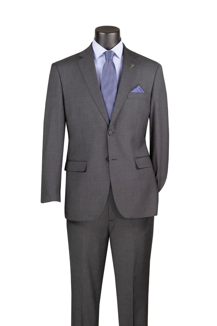 The Modern Fit Charcoal 100% Wool Single Breasted 2-Button Suit MW100 by Vinci Suits is shown with a light blue shirt, blue tie, and matching pocket square.