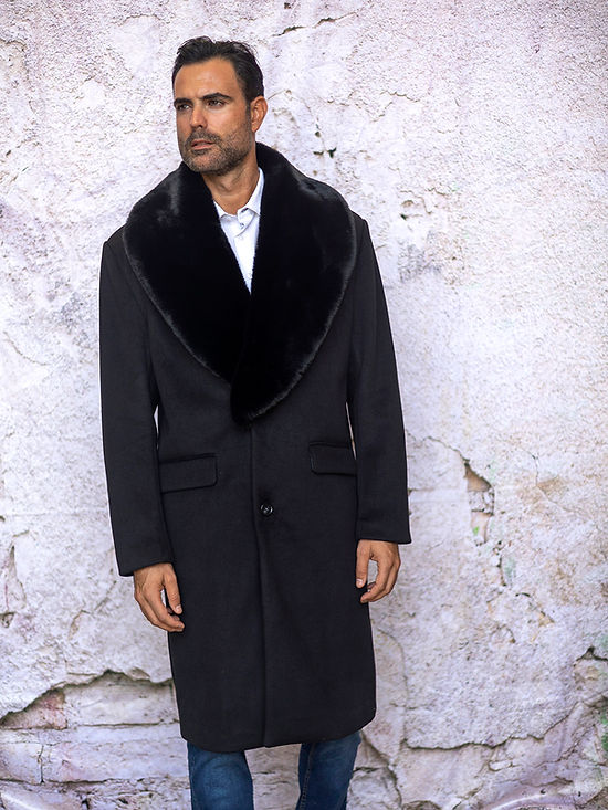 A man in an Insomnia MANZINI MZW-321 Black 3/4 Faux Fur Collar Winter Coat stands against a textured, off-white wall.