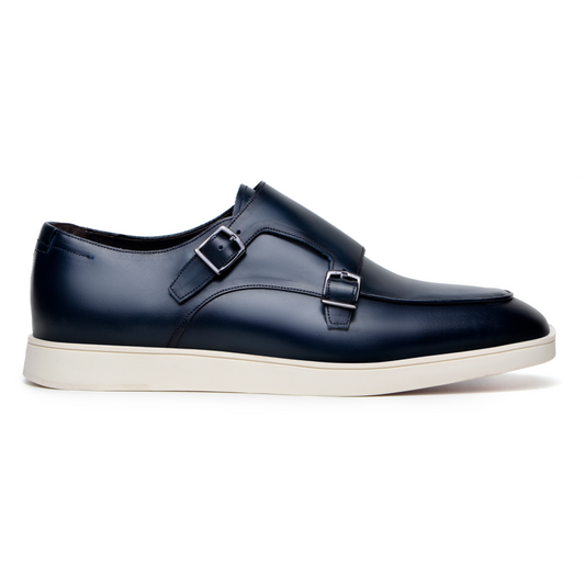 The BELVEDERE Belvedere - Marcio Hybrid Double Buckle Dress Shoe in navy Nappa leather features a white rubber sole. Made in Brazil, it's shown from the side on a white background.