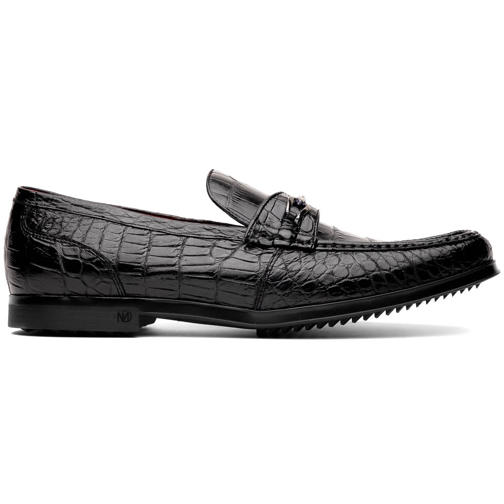 The Milan Black by Marco Di Milano is a black crocodile-pattern leather loafer with a metallic logo detail on the strap and red interior lining, epitomizing luxury men’s footwear.