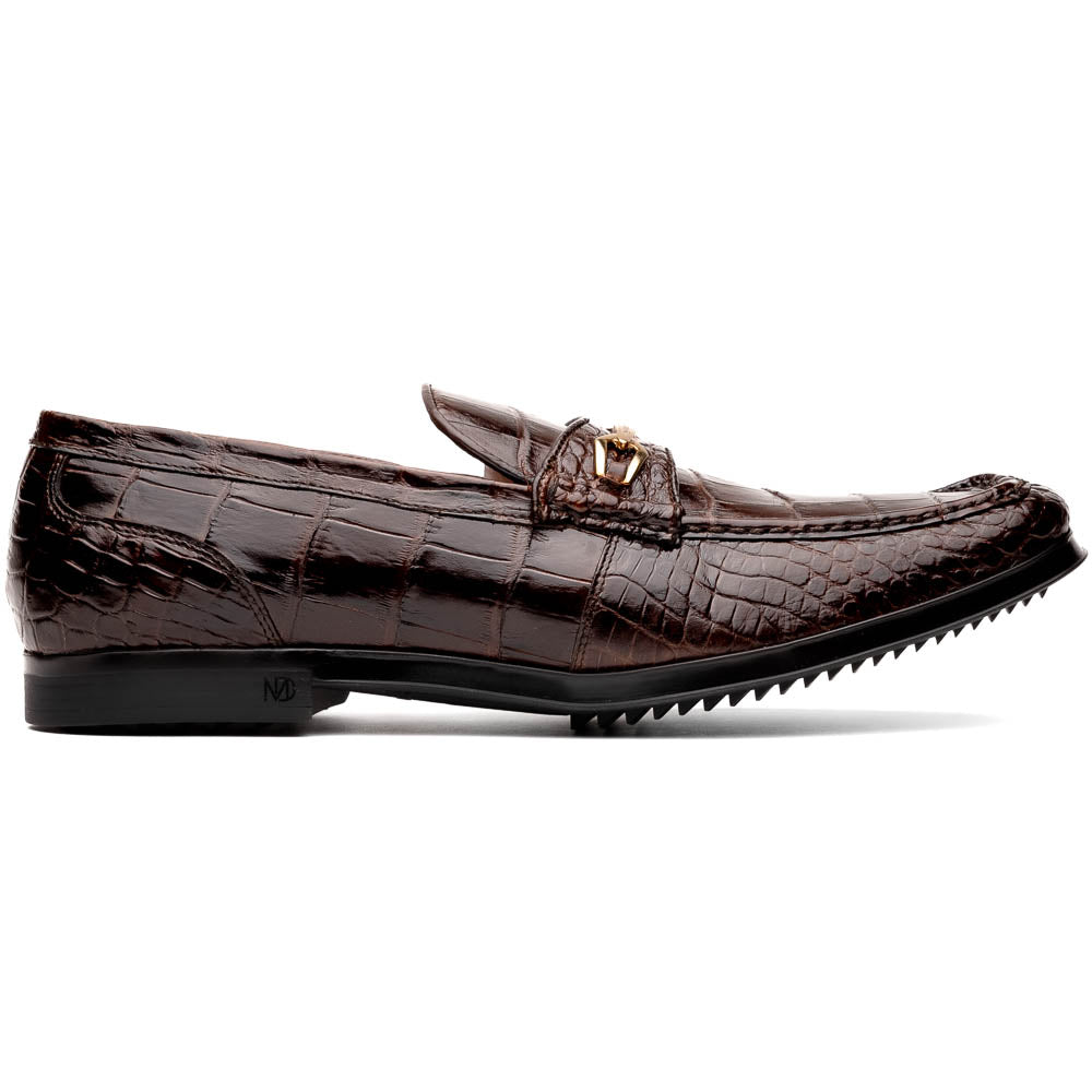 A pair of Marco Di Milano "Milan Brown" luxury loafers featuring brown crocodile-pattern leather and a metal buckle; one shoe is upright while the other is on its side, displaying the sole.
