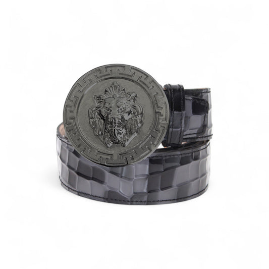 The Matiste Grey Leather Belt NS1 by Matiste features hand-finished Italian leather with a textured surface and a large round buckle engraved with a lion's head design.