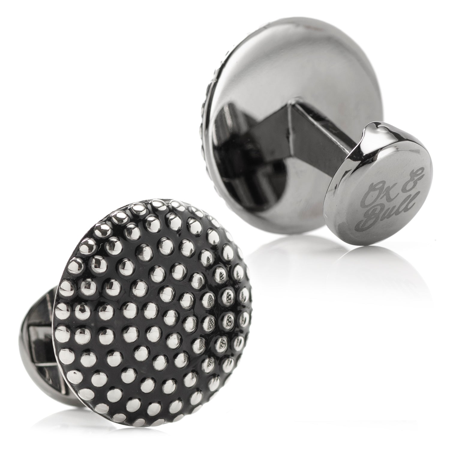 The Silver Circle Dot Texture Cufflinks by Cufflinks.com feature a stylish, textured surface with polished raised dots on a dark background—perfect for those who appreciate modern sophistication in their accessories.