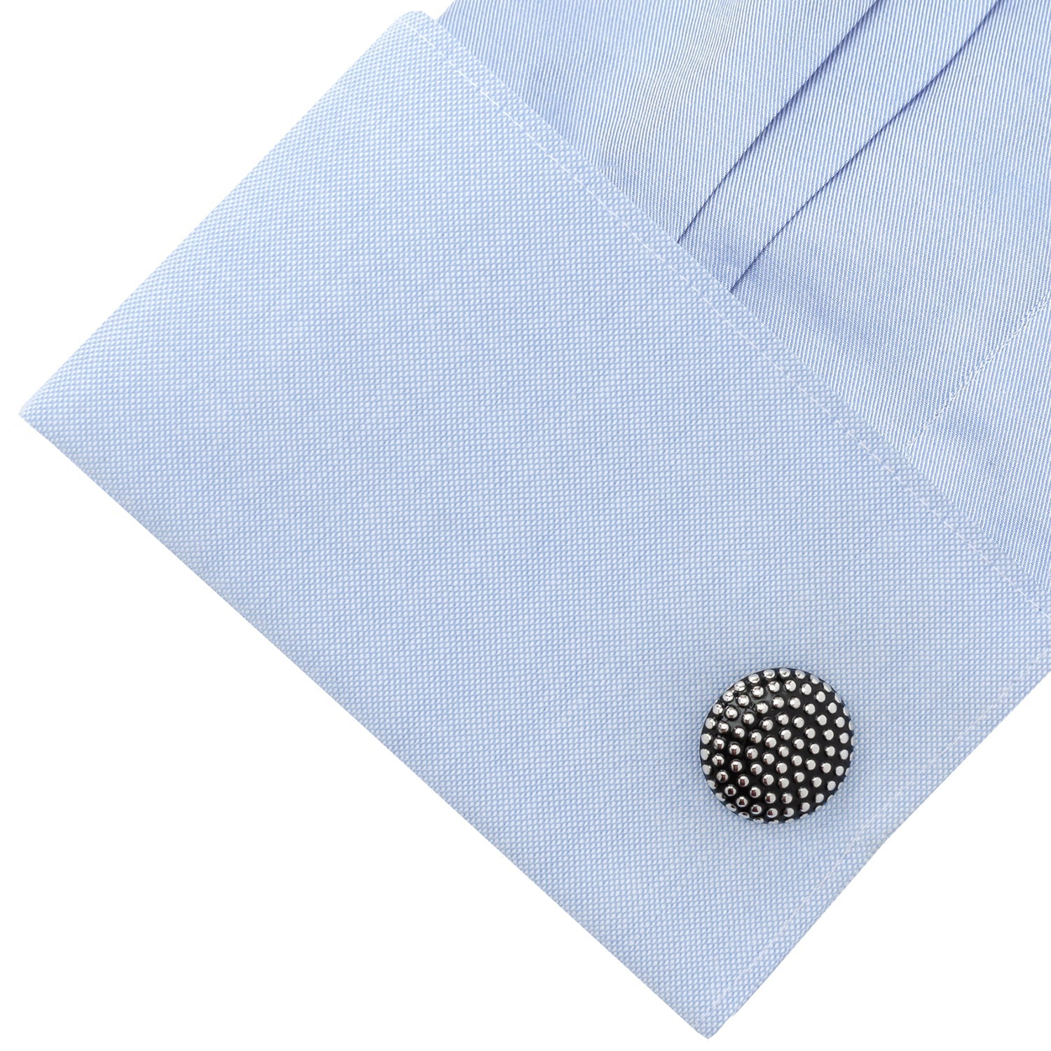 The Silver Circle Dot Texture Cufflinks by Cufflinks.com feature a stylish, textured surface with polished raised dots on a dark background—perfect for those who appreciate modern sophistication in their accessories.