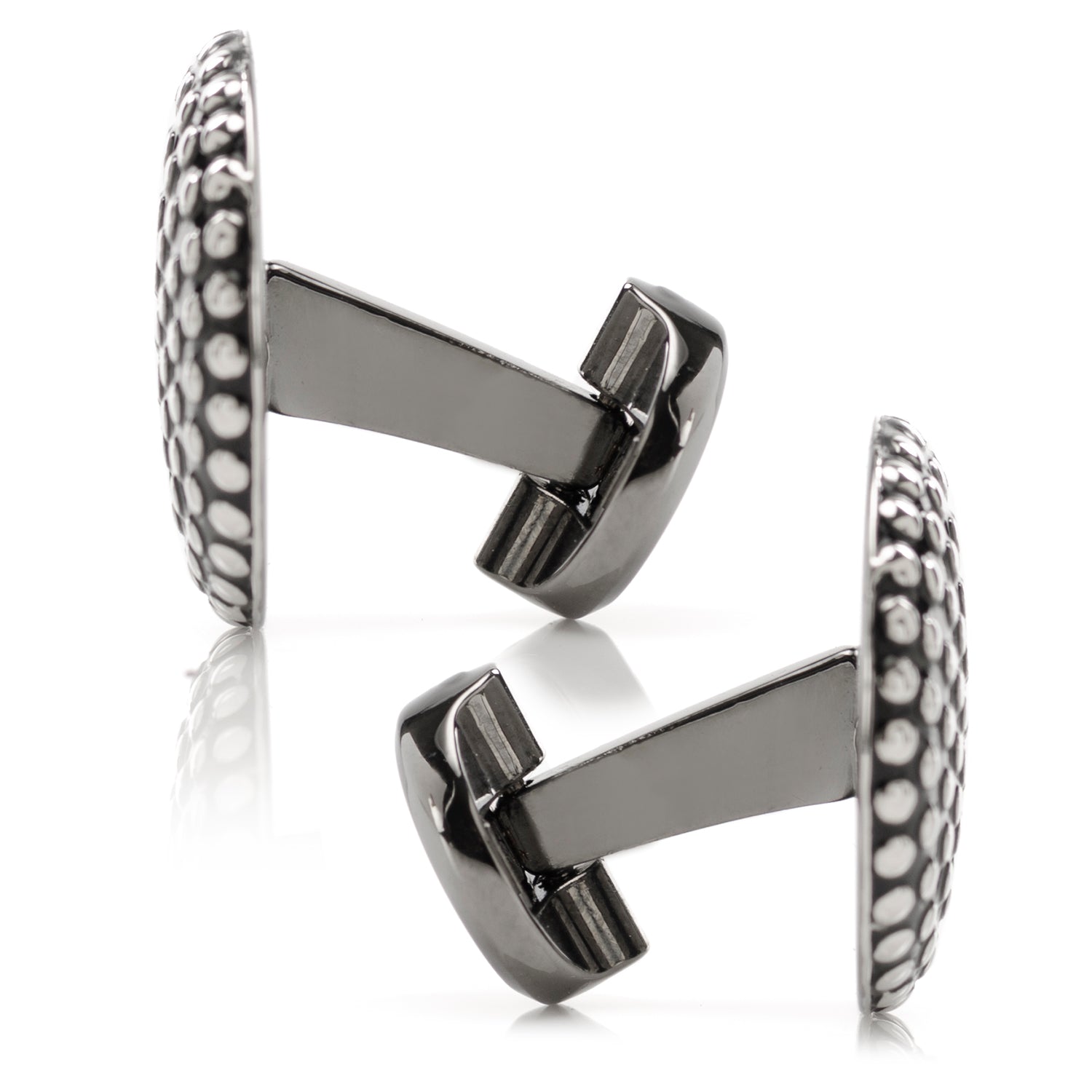 The Silver Circle Dot Texture Cufflinks by Cufflinks.com feature a stylish, textured surface with polished raised dots on a dark background—perfect for those who appreciate modern sophistication in their accessories.