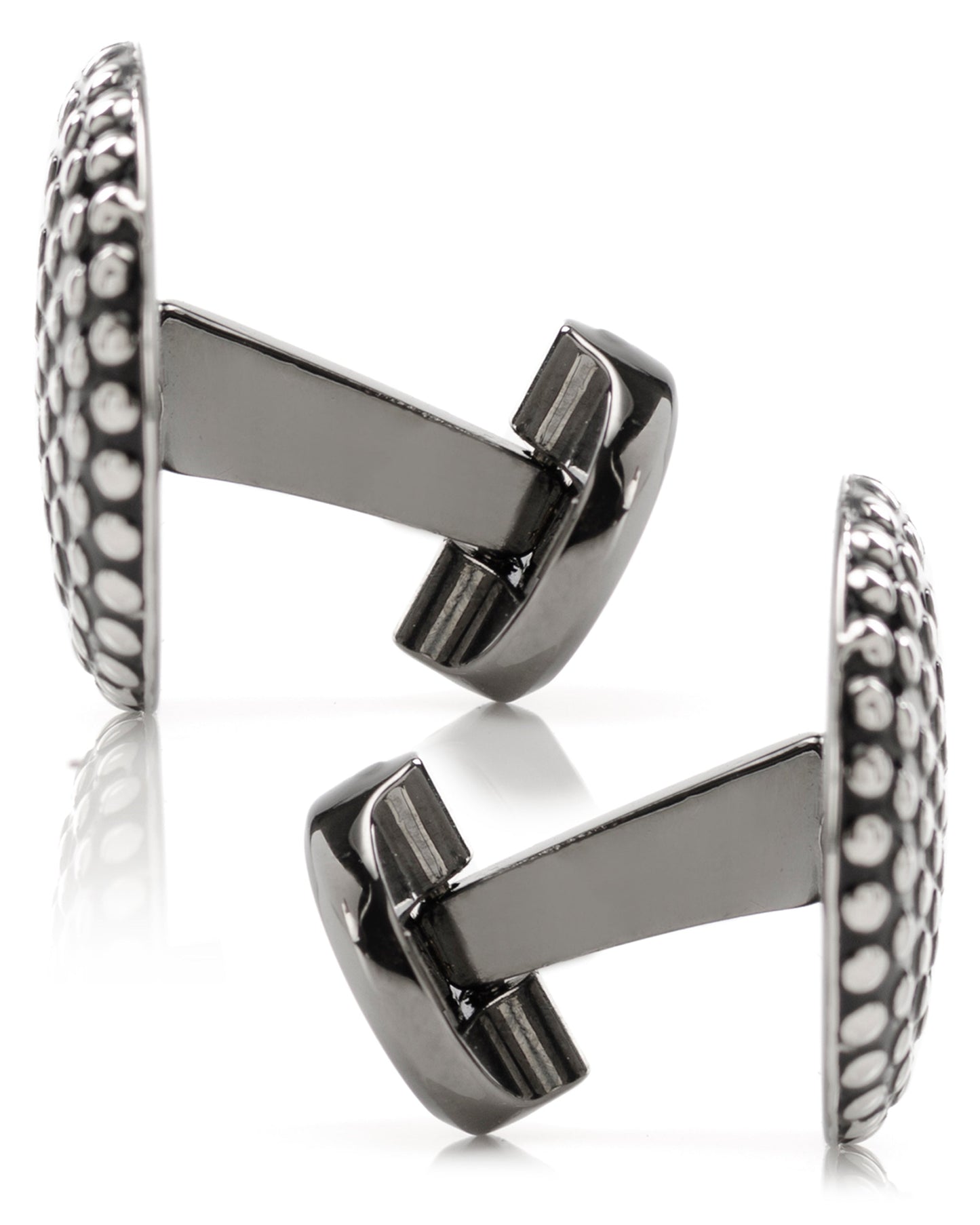 The Silver Circle Dot Texture Cufflinks by Cufflinks.com feature a stylish, textured surface with polished raised dots on a dark background—perfect for those who appreciate modern sophistication in their accessories.