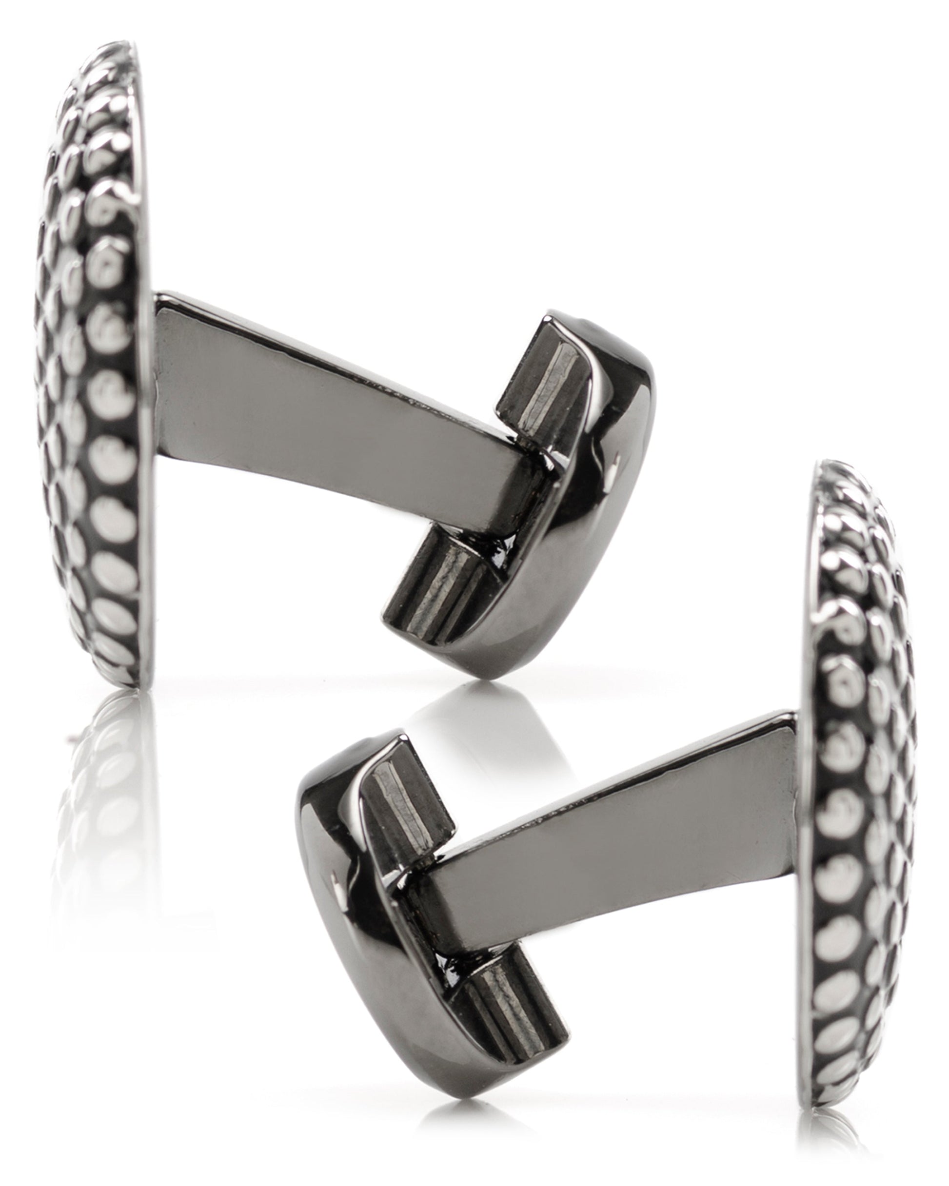The Silver Circle Dot Texture Cufflinks by Cufflinks.com feature a stylish, textured surface with polished raised dots on a dark background—perfect for those who appreciate modern sophistication in their accessories.