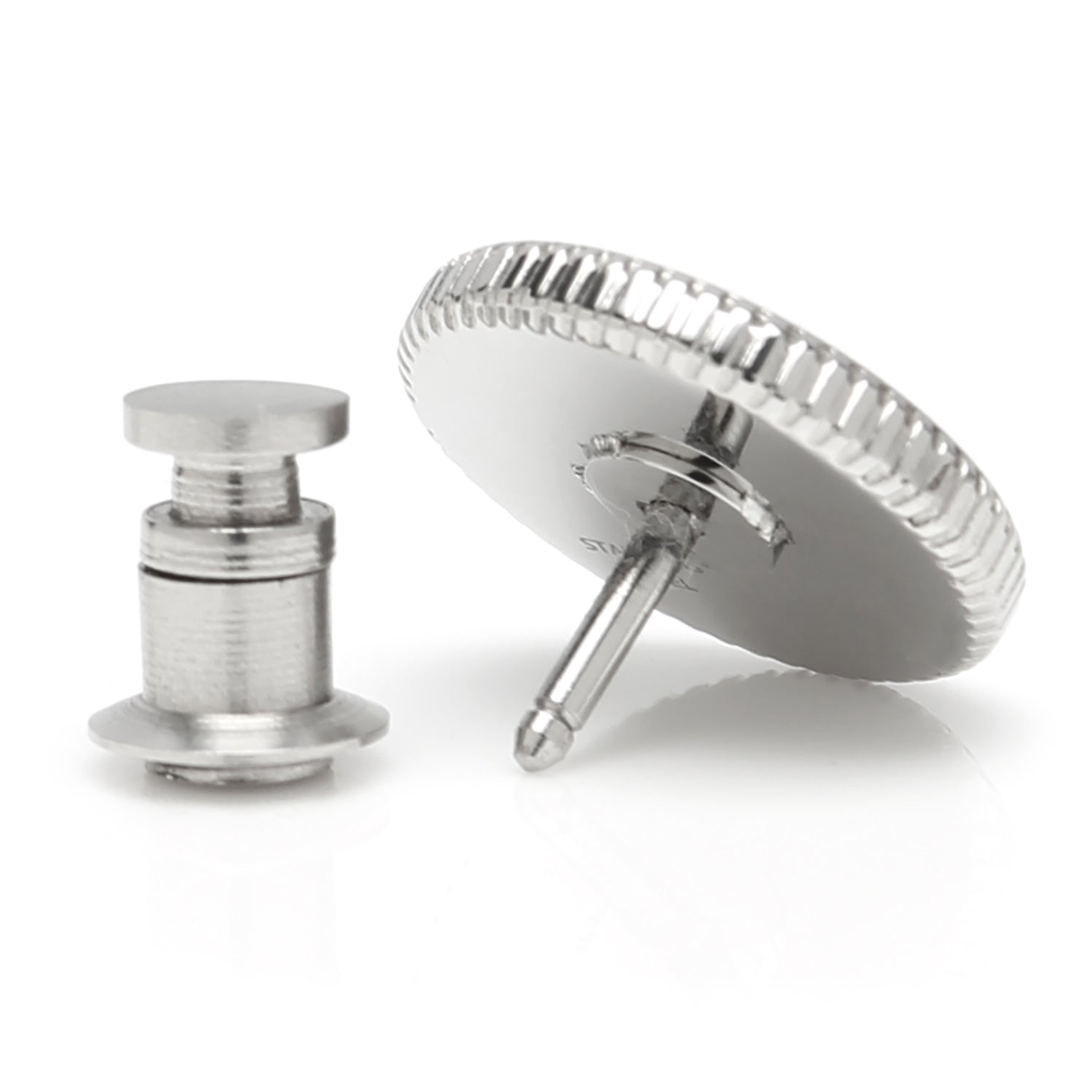 The Cufflinks.com Stainless Steel Coin Edge Engravable Lapel Pin features a round, silver-colored design with a textured coin edge and a smooth, flat front, perfect for engraving.