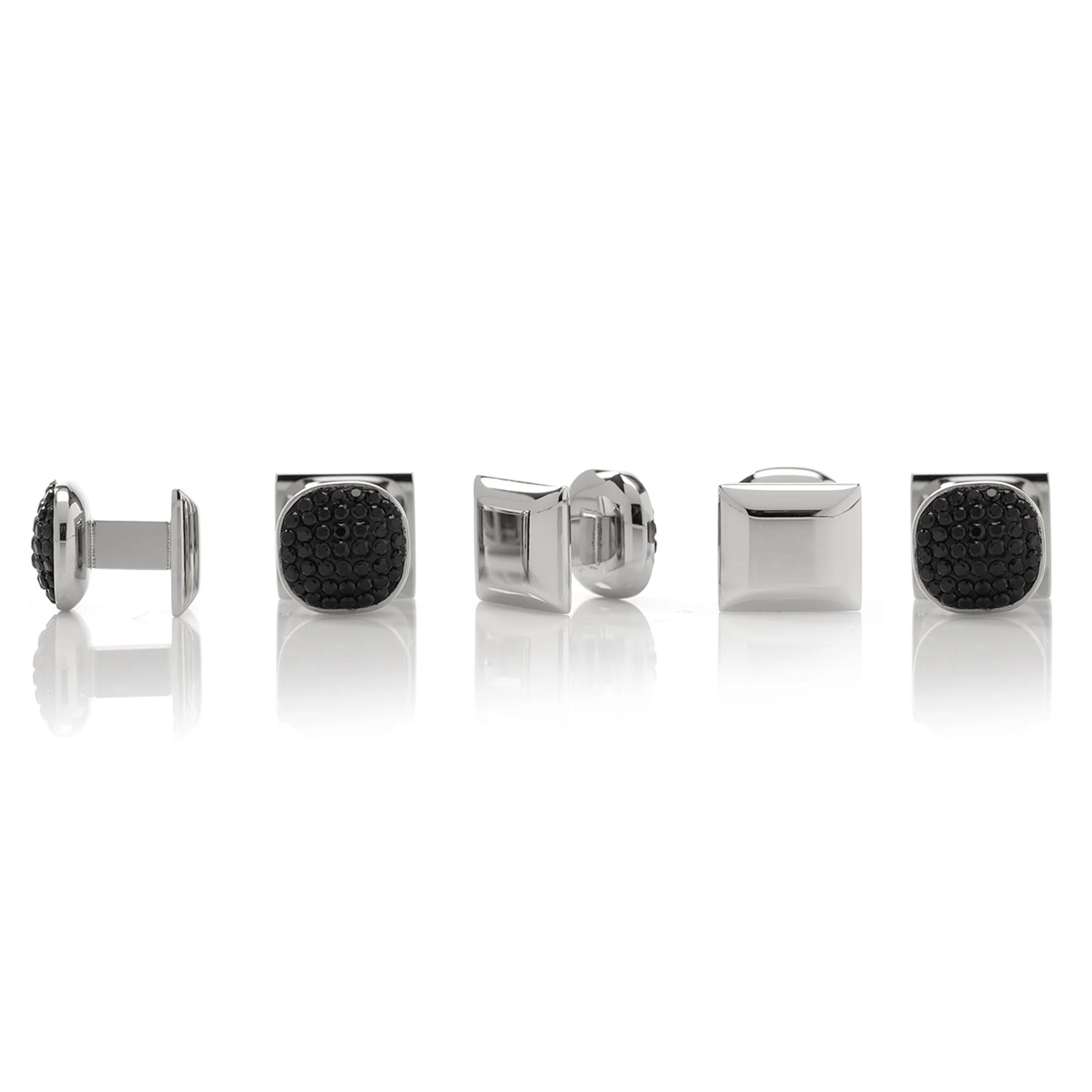 The Cufflinks.com Stainless Steel Black Pave Crystal 5-Stud Set features sleek cufflinks and shirt studs with black textured faces, elegantly displayed on a white background.