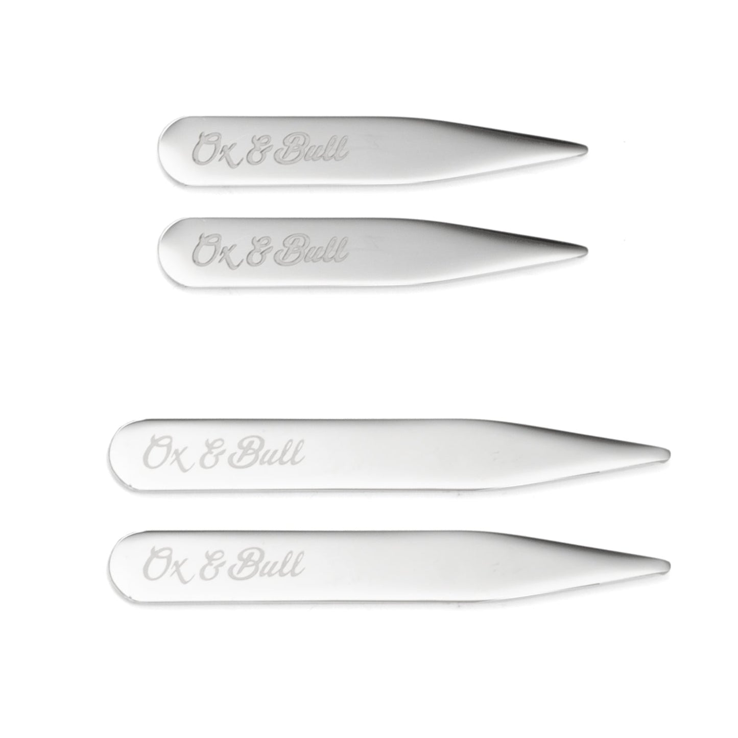 The Collar Stay - 2 Pair Set by Cufflinks.com features four polished stainless steel stays, each engraved with "Ox & Bull" and neatly arranged by size on a white background.