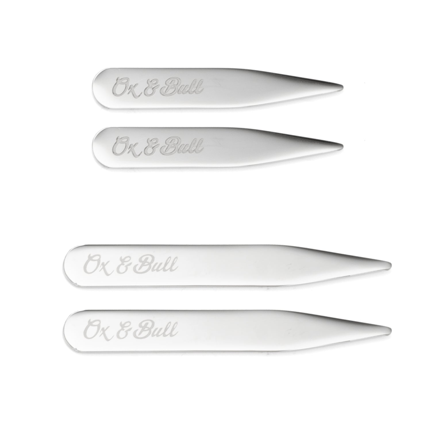 The Collar Stay - 2 Pair Set by Cufflinks.com features four polished stainless steel stays, each engraved with "Ox & Bull" and neatly arranged by size on a white background.