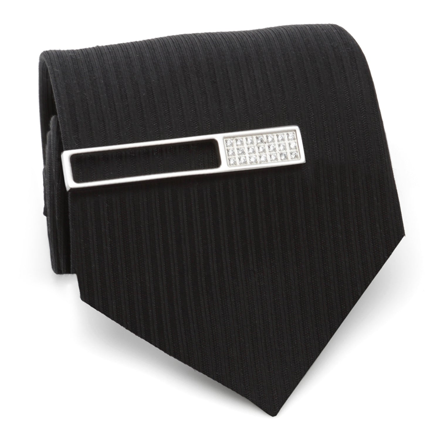The Die Cut Crystal Stainless Steel Tie Clip by Cufflinks.com features a rectangular cutout design with a row of clear gemstones on one end, crafted from stainless steel and shown on a white background.
